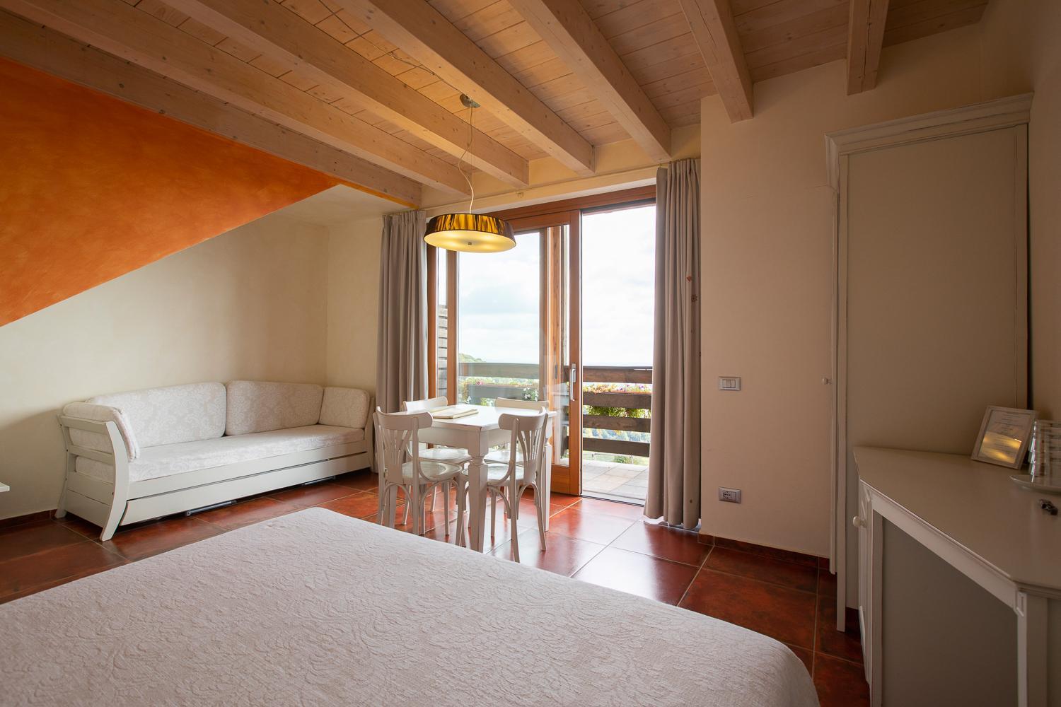 Family Room with Balcony - Photo 8