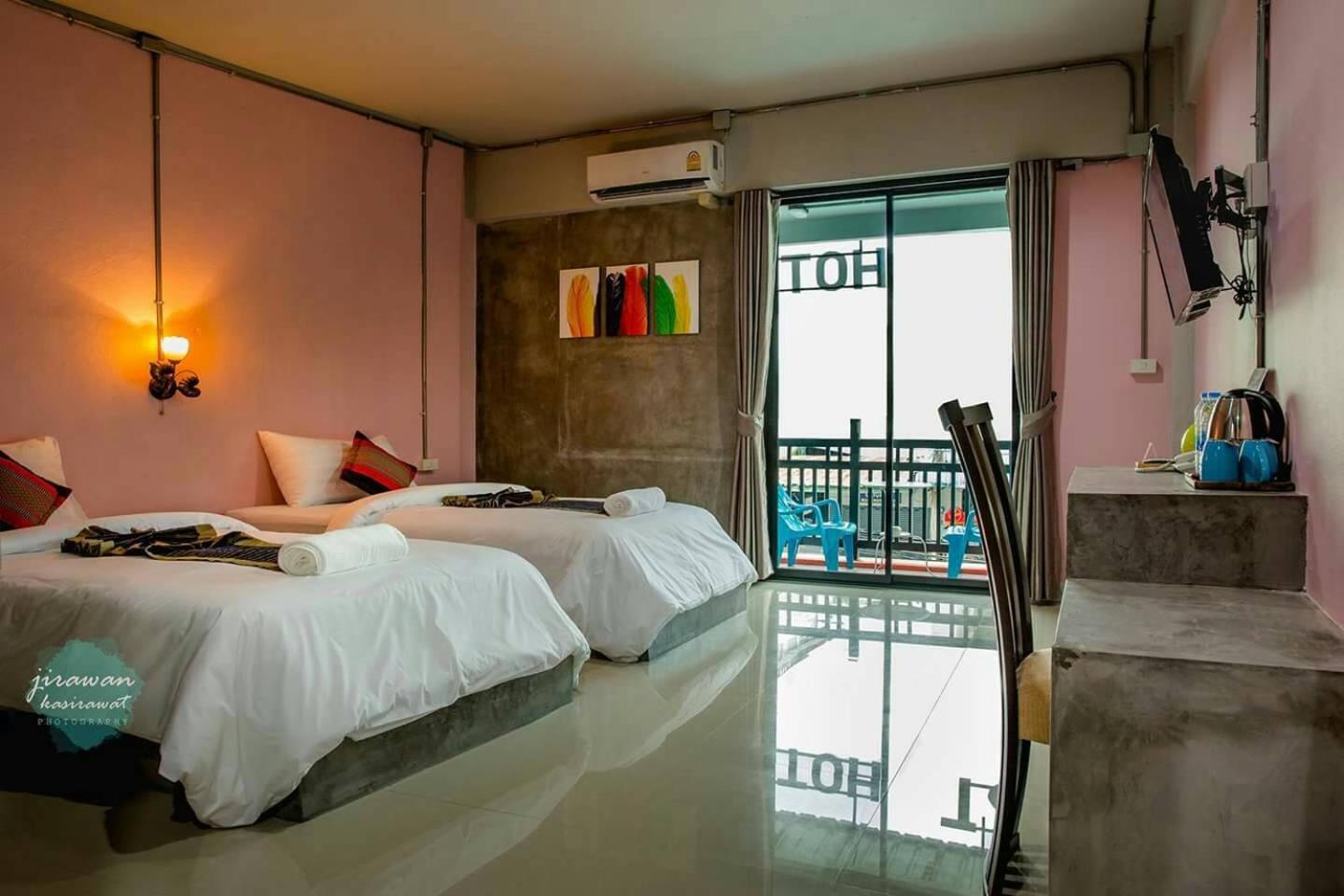Deluxe Queen Room with Two Queen Beds - Photo 1