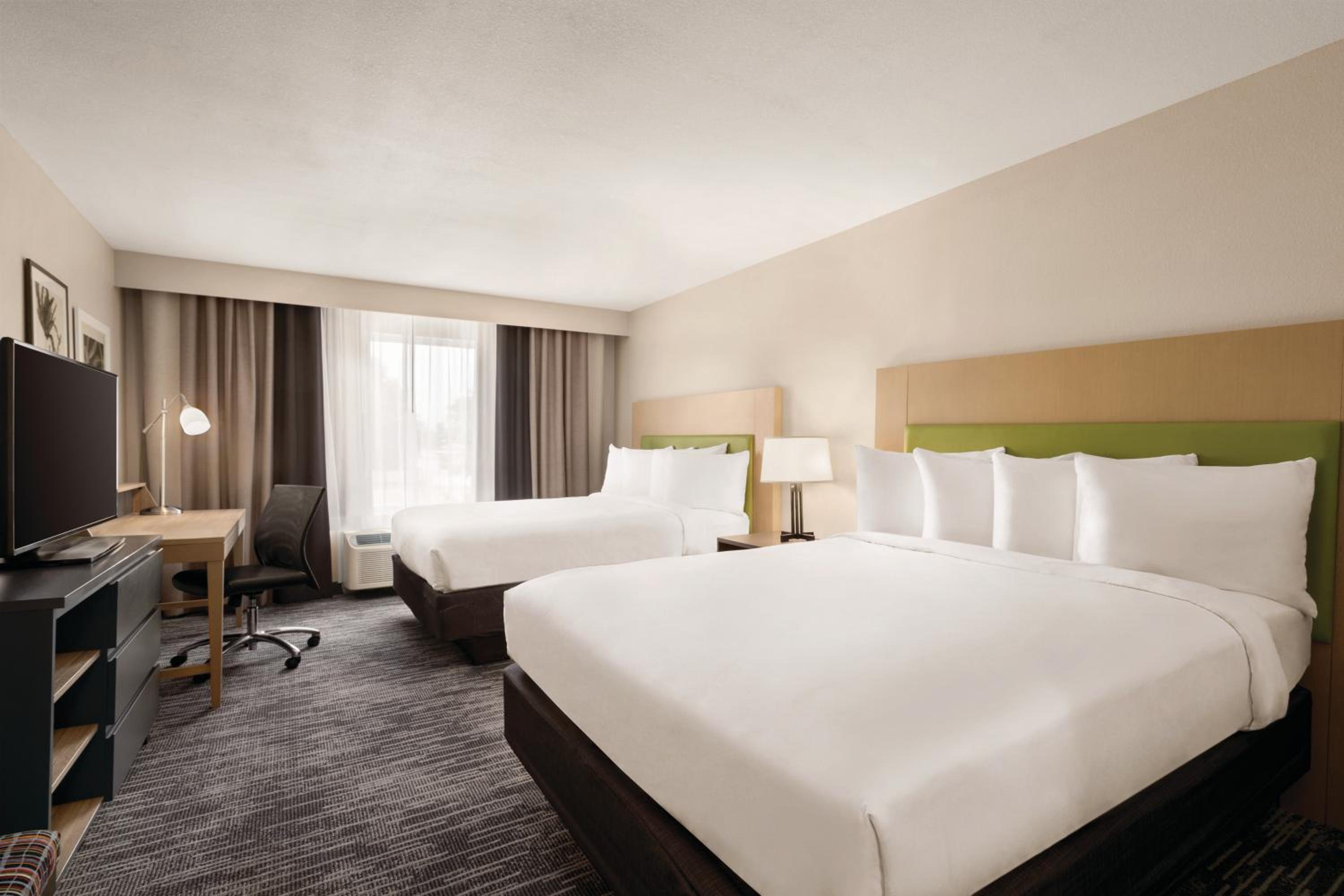 Queen Room with Two Queen Beds with Roll In Shower - Disability Access/Non-Smoking - Photo 1