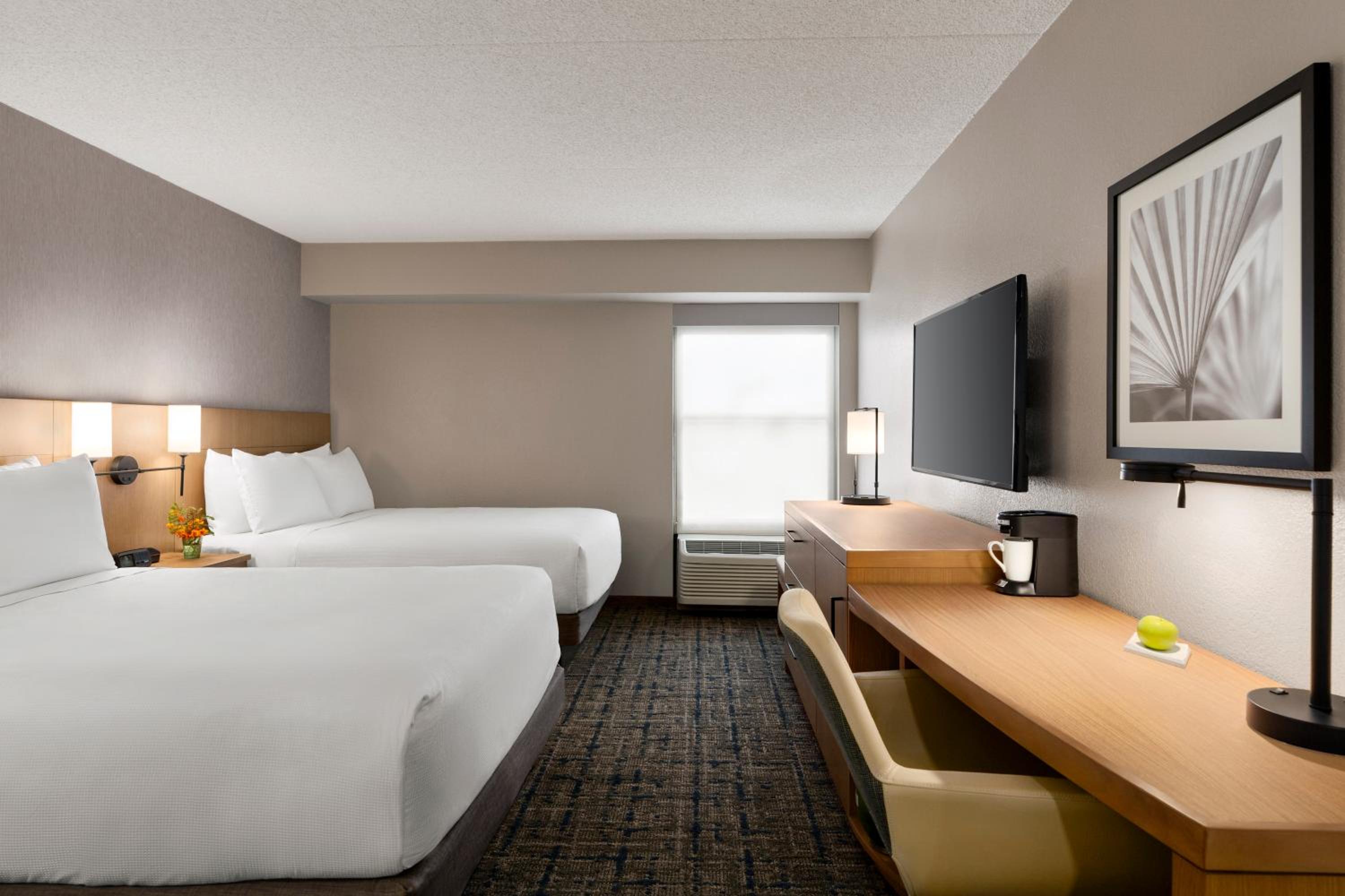 Queen Room with Two Queen Beds - Photo 1