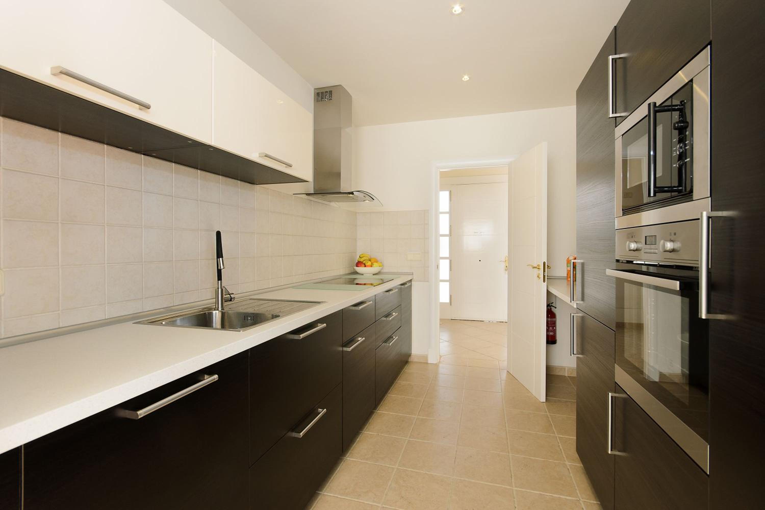 Three-Bedroom House - Photo 2