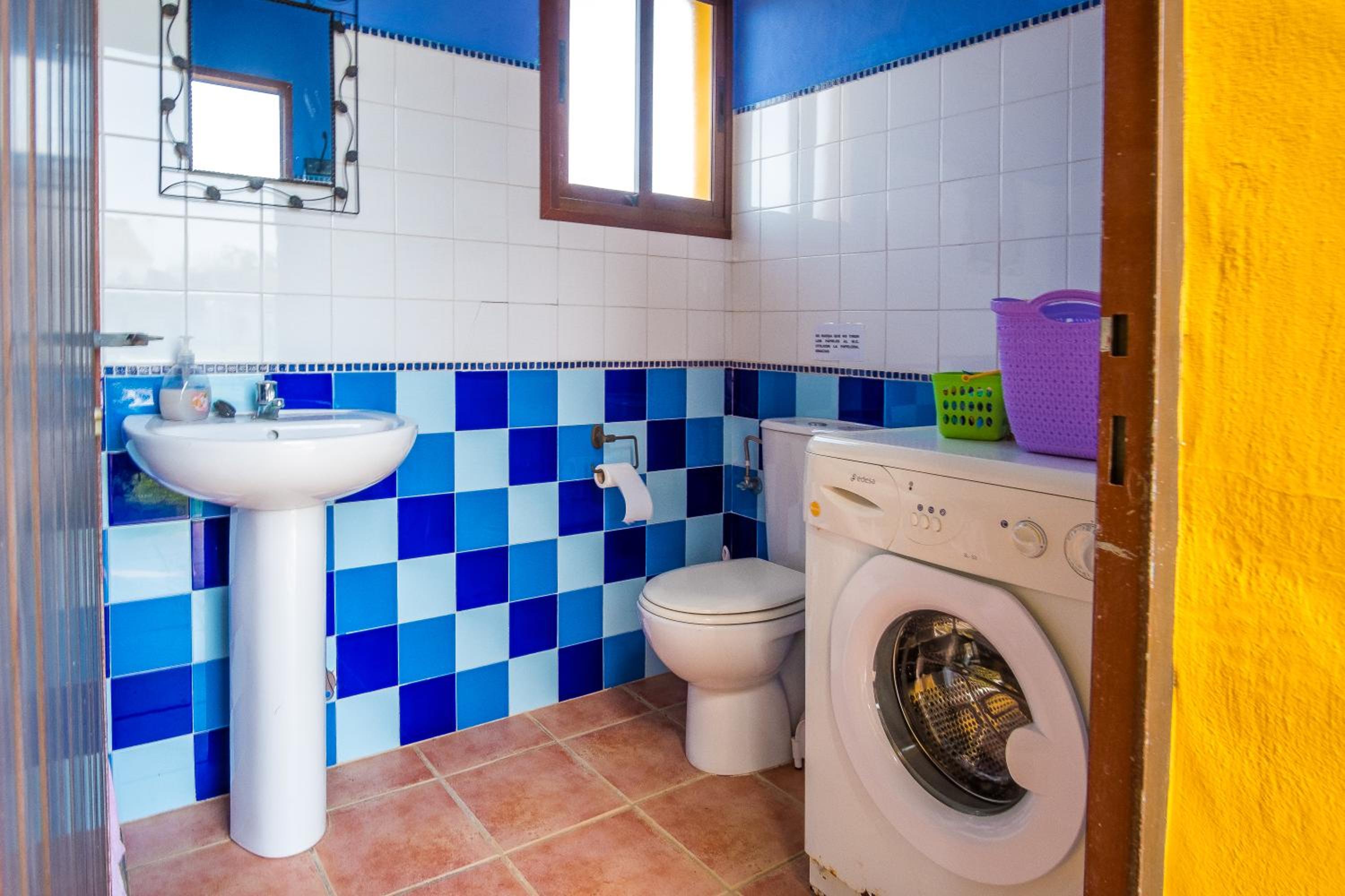 Three-Bedroom House - Photo 26