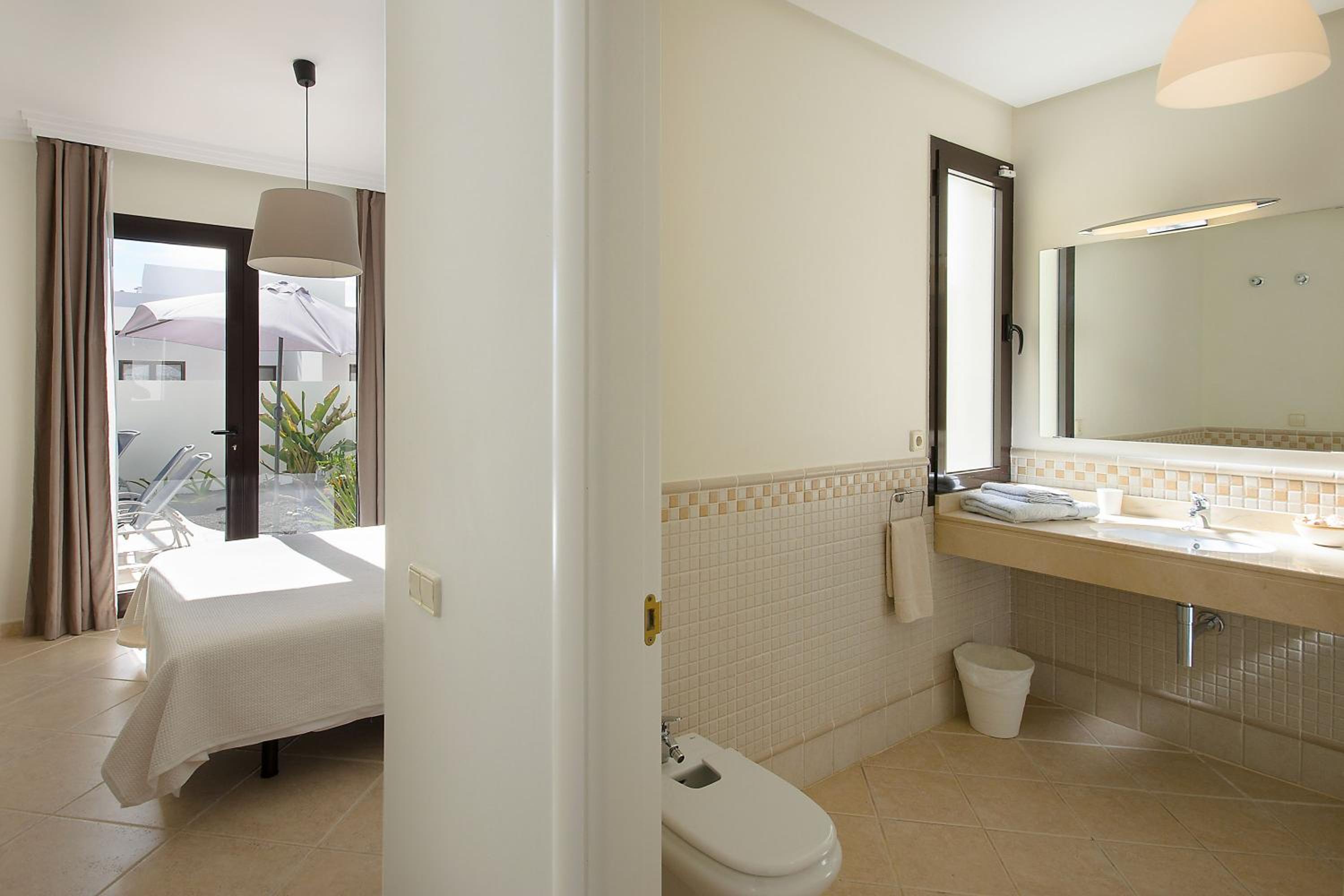 Three-Bedroom House - Photo 3