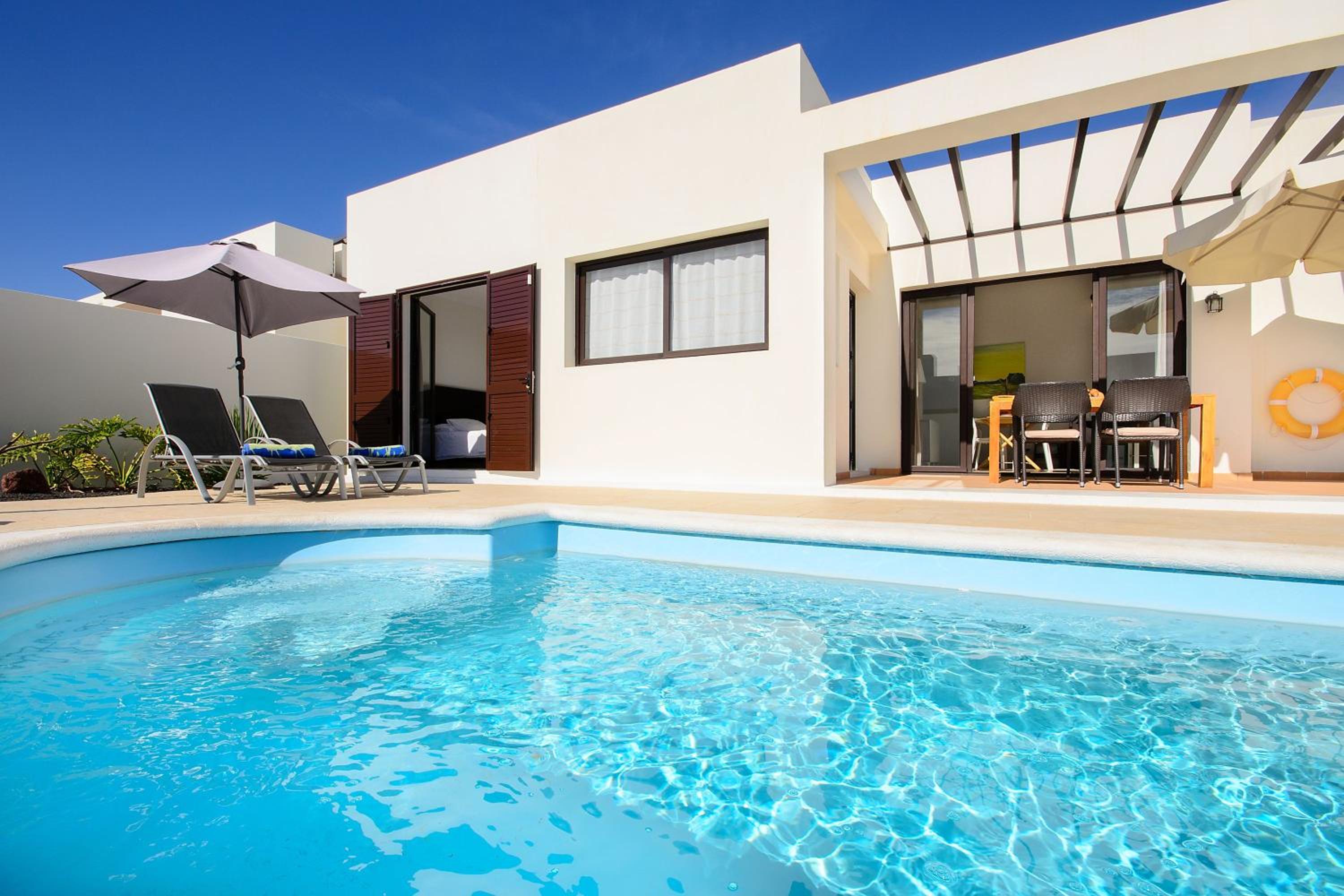 Three-Bedroom House - Photo 14