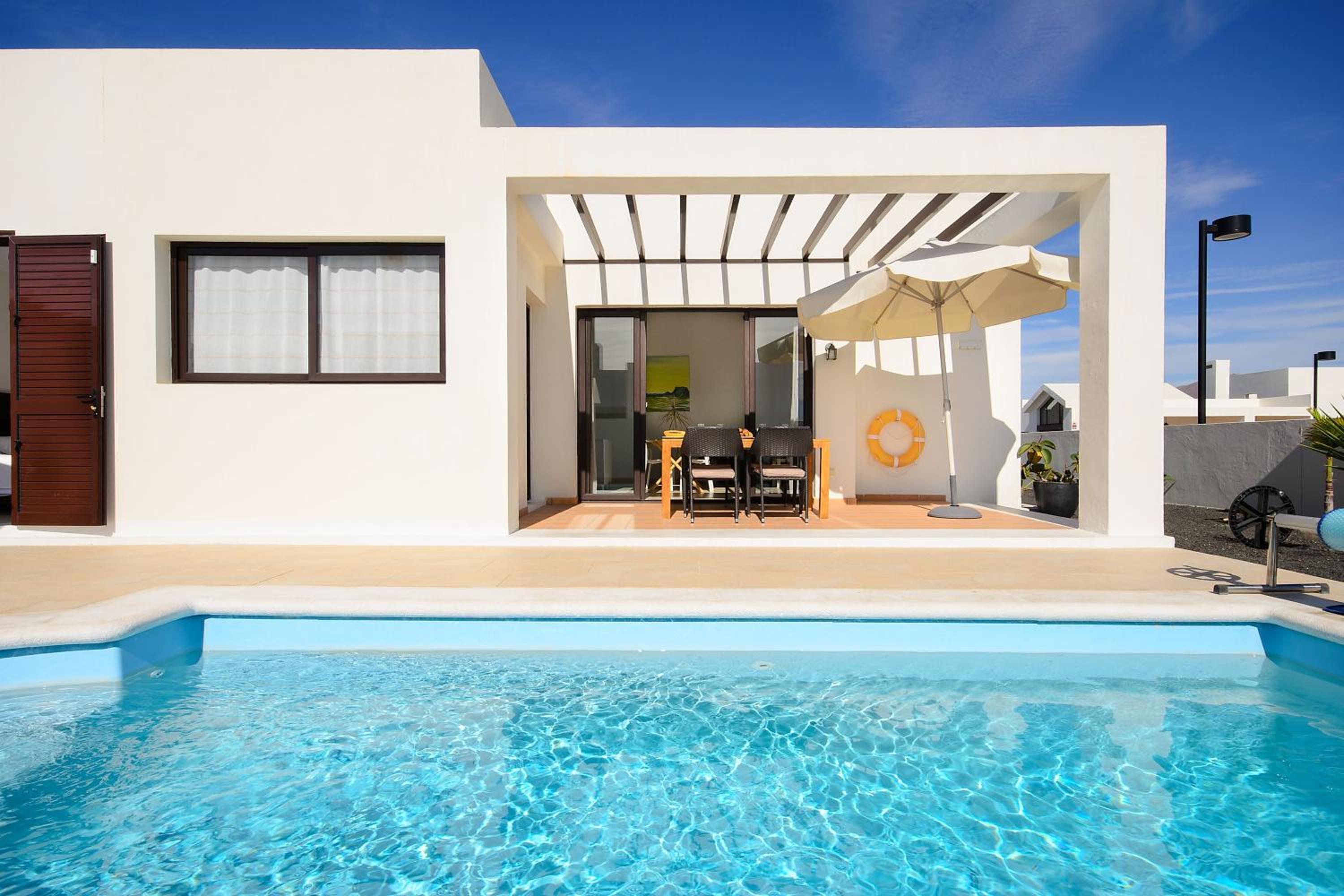 Three-Bedroom House - Photo 26