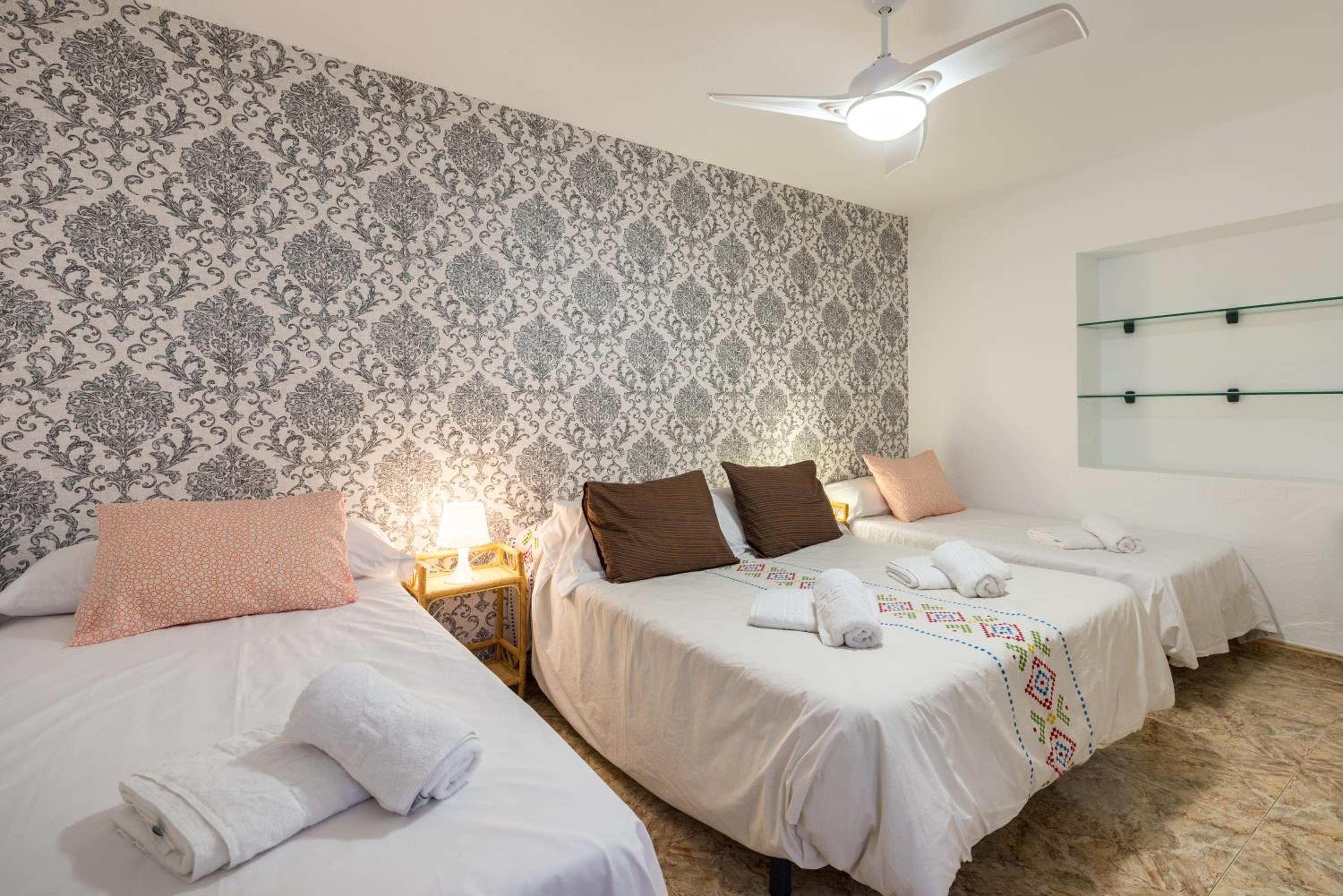 Three-Bedroom House - Photo 27