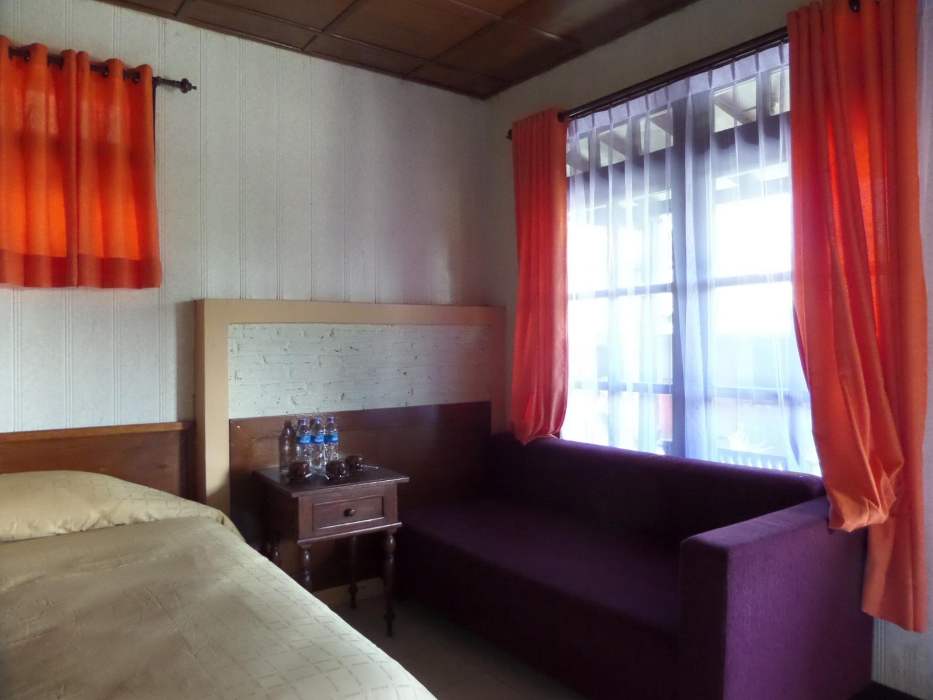 Deluxe Triple Room - Photo 10