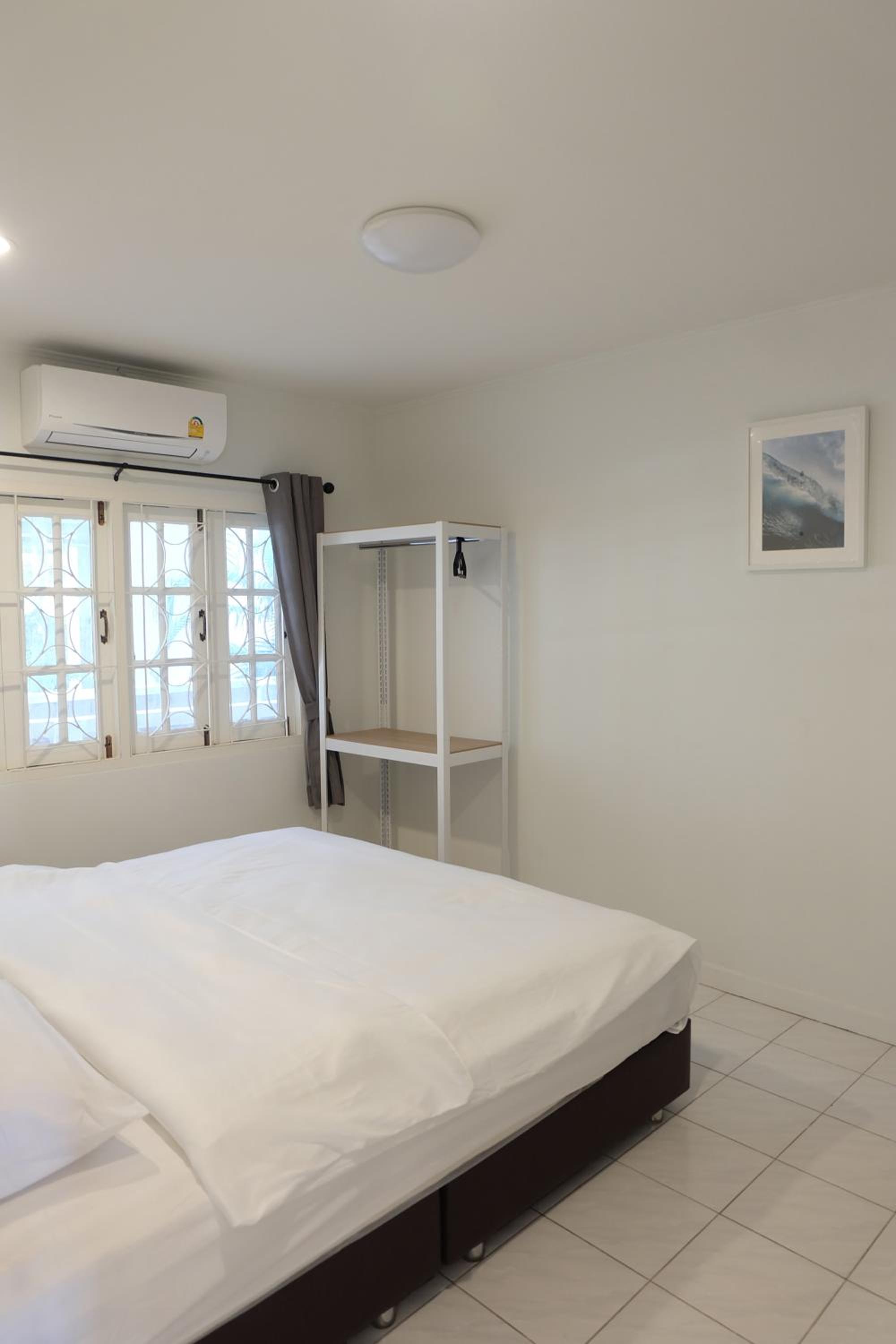 Four-Bedroom House - Photo 25