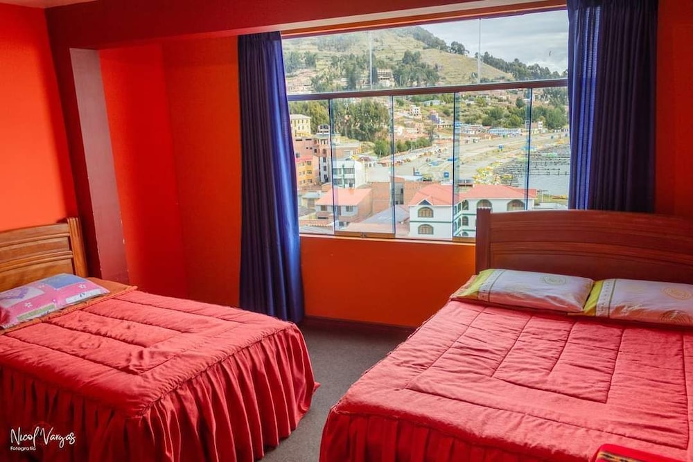 Basic Quadruple Room, Beach View photo 1