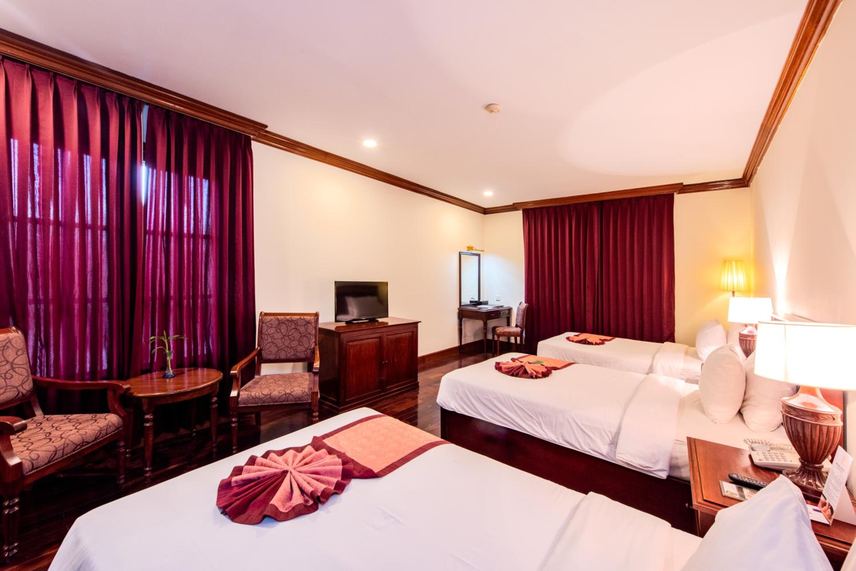 Deluxe Triple Room - Photo 2