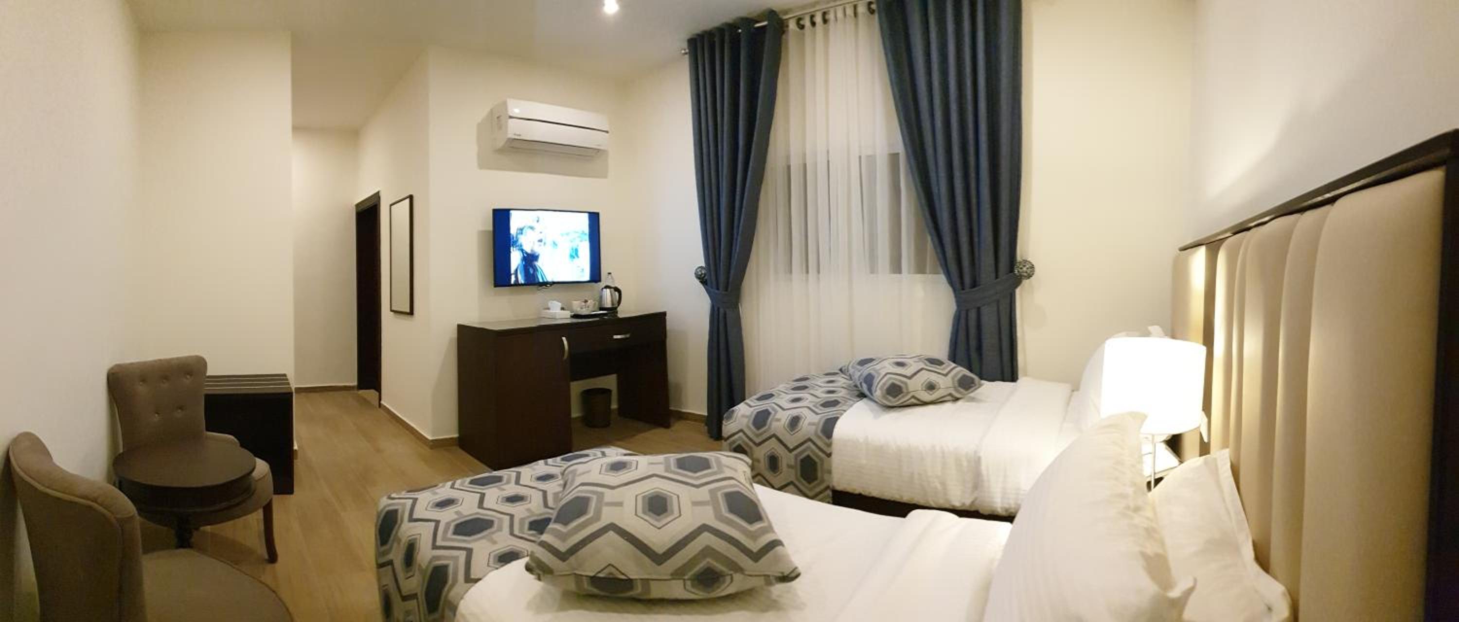 Deluxe Twin Room - Photo 7