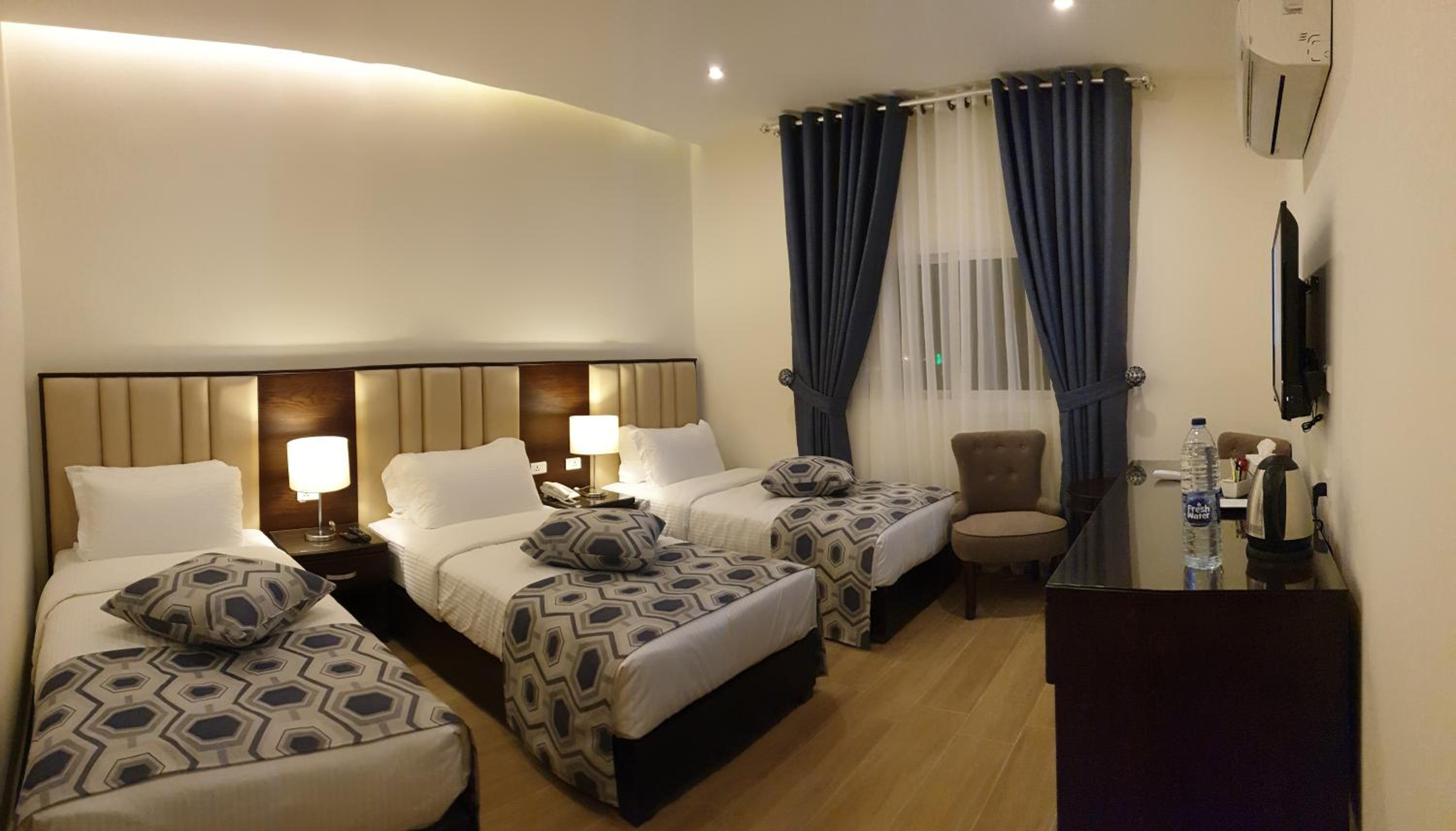 Deluxe Triple Room - Photo 6