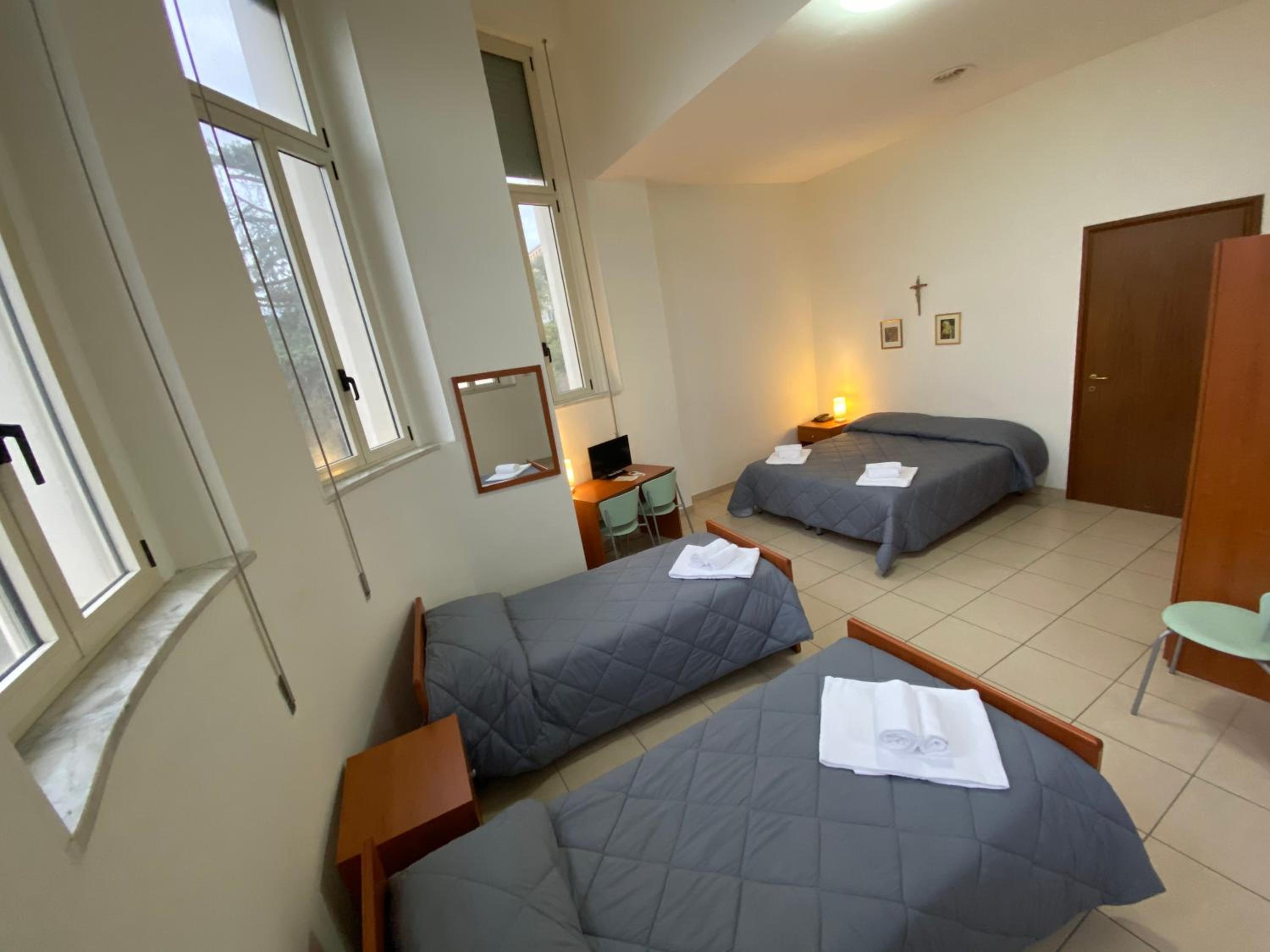 Quadruple Room with Private Bathroom