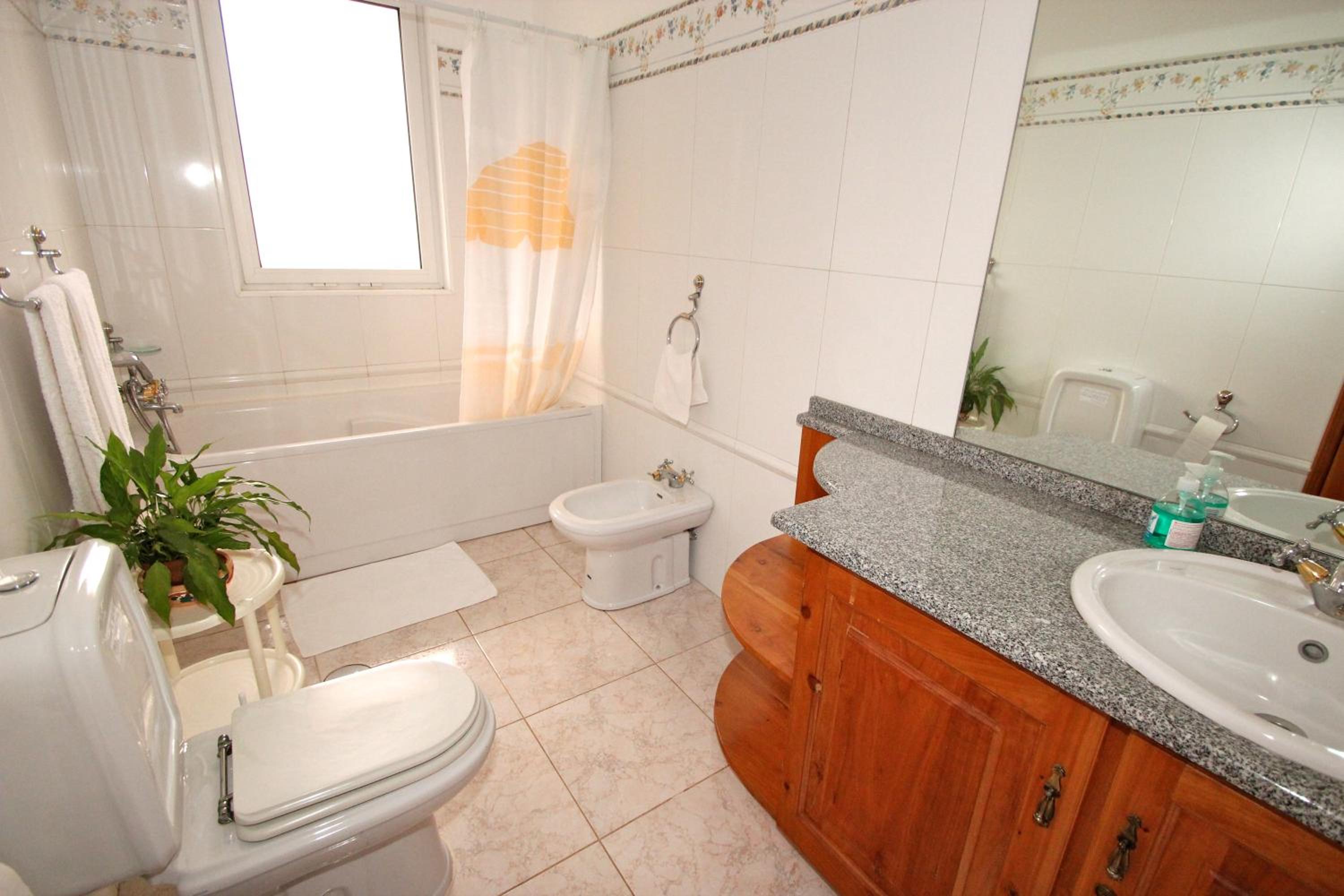Three-Bedroom House photo 3