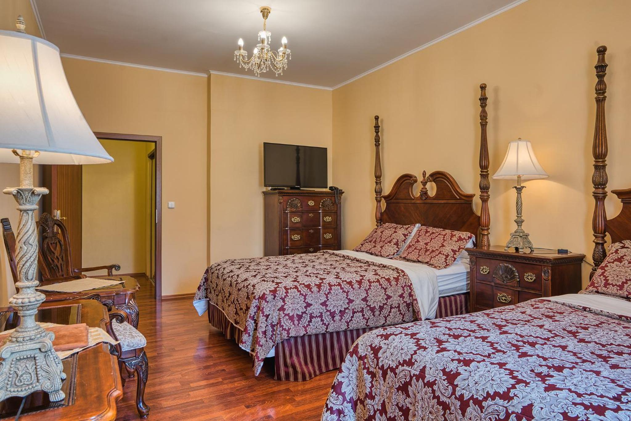 Deluxe Quadruple Room with Two Queen Beds - Photo 2
