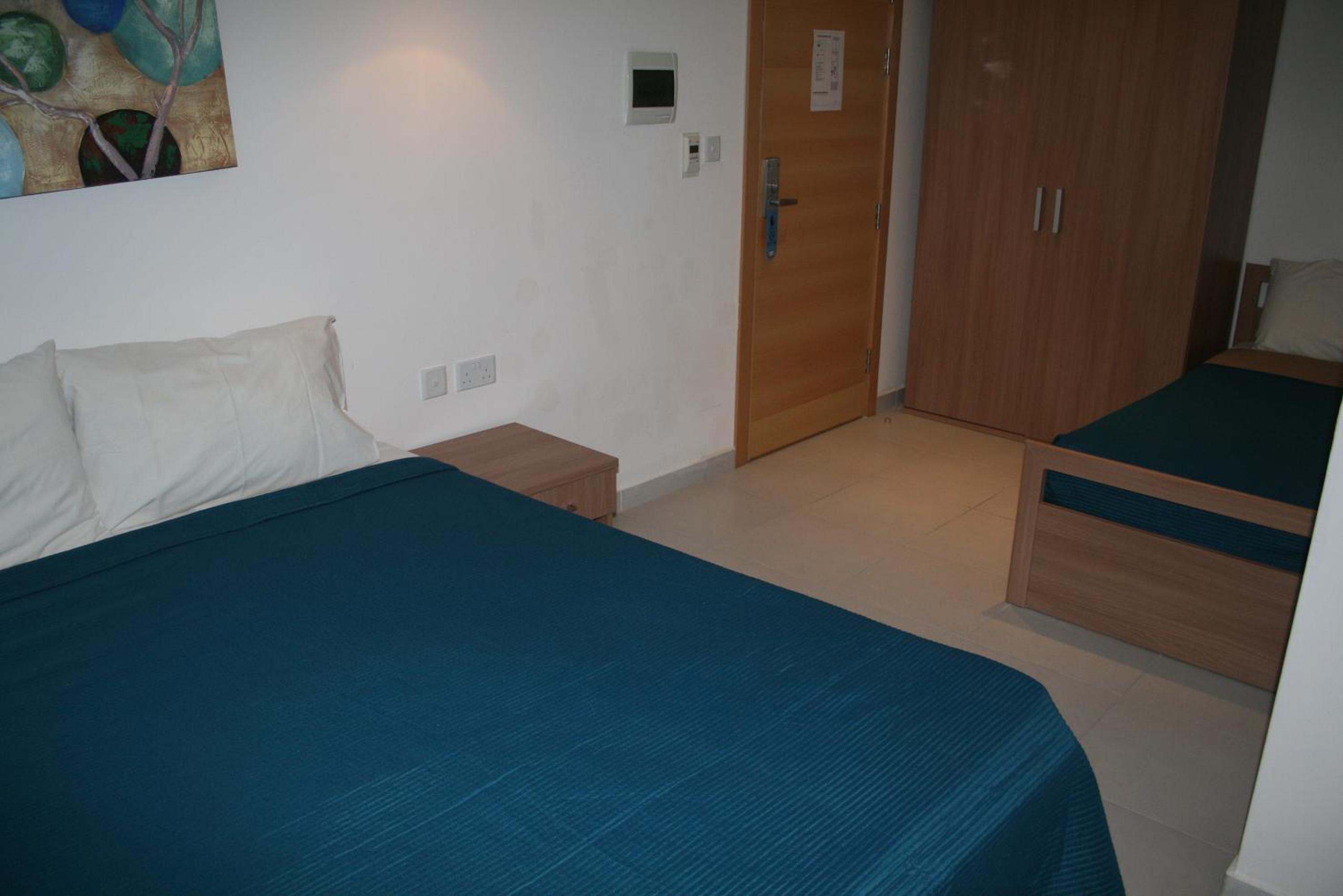 Family Room (2 Adults + 2 Children) with Free Airport Transfer photo 3