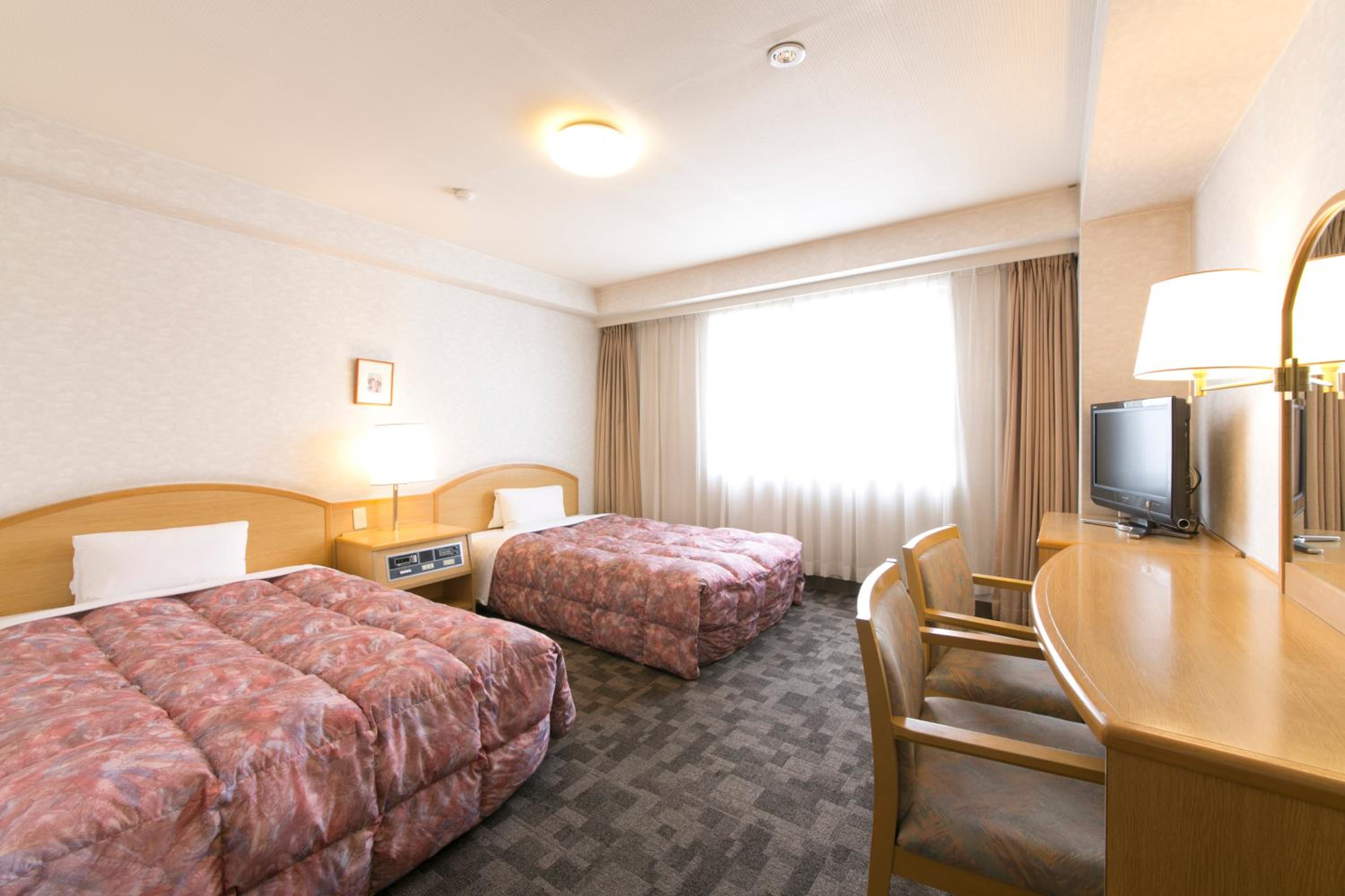 Twin Room - Non-Smoking - Photo 1