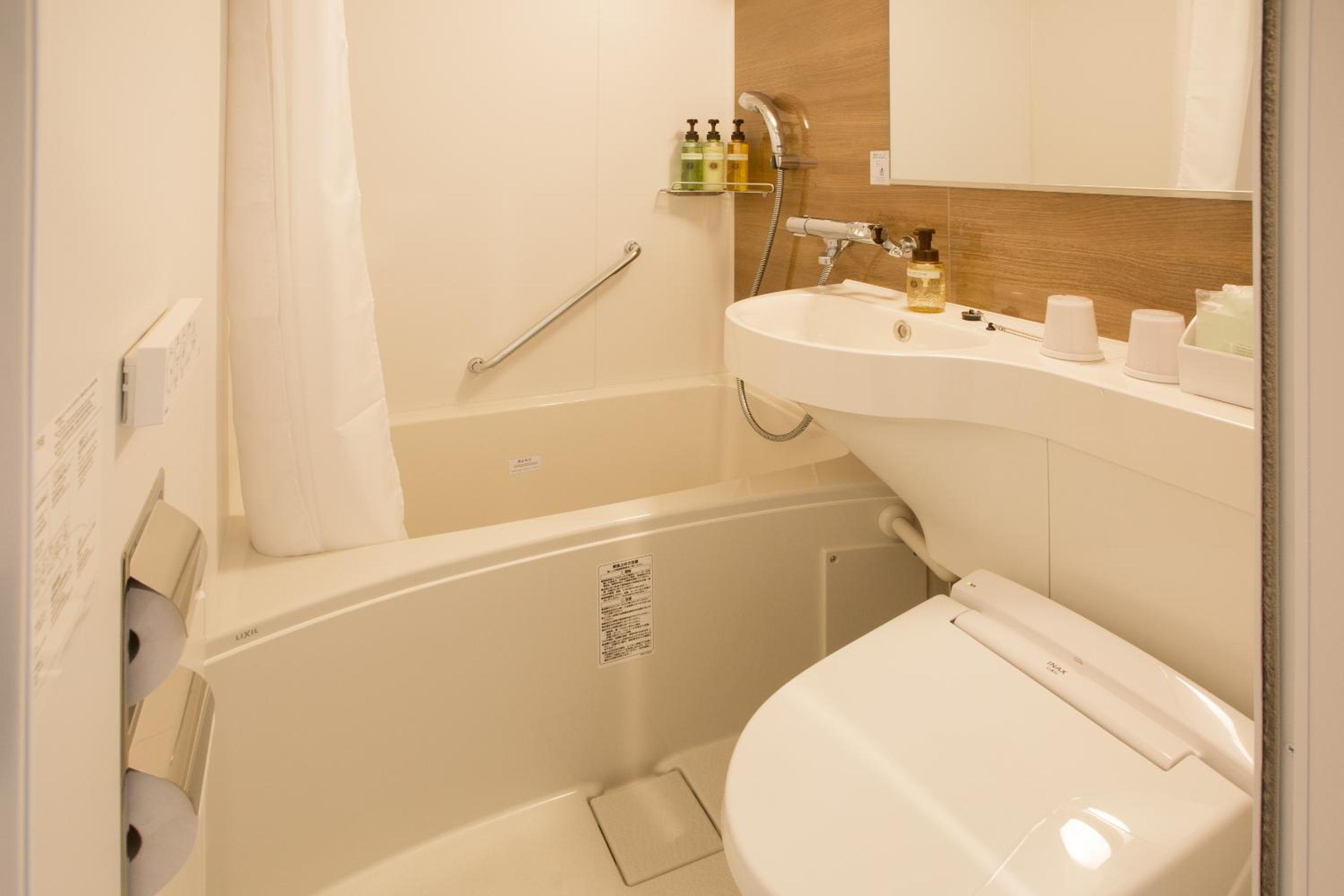 Standard Twin Room - Photo 8