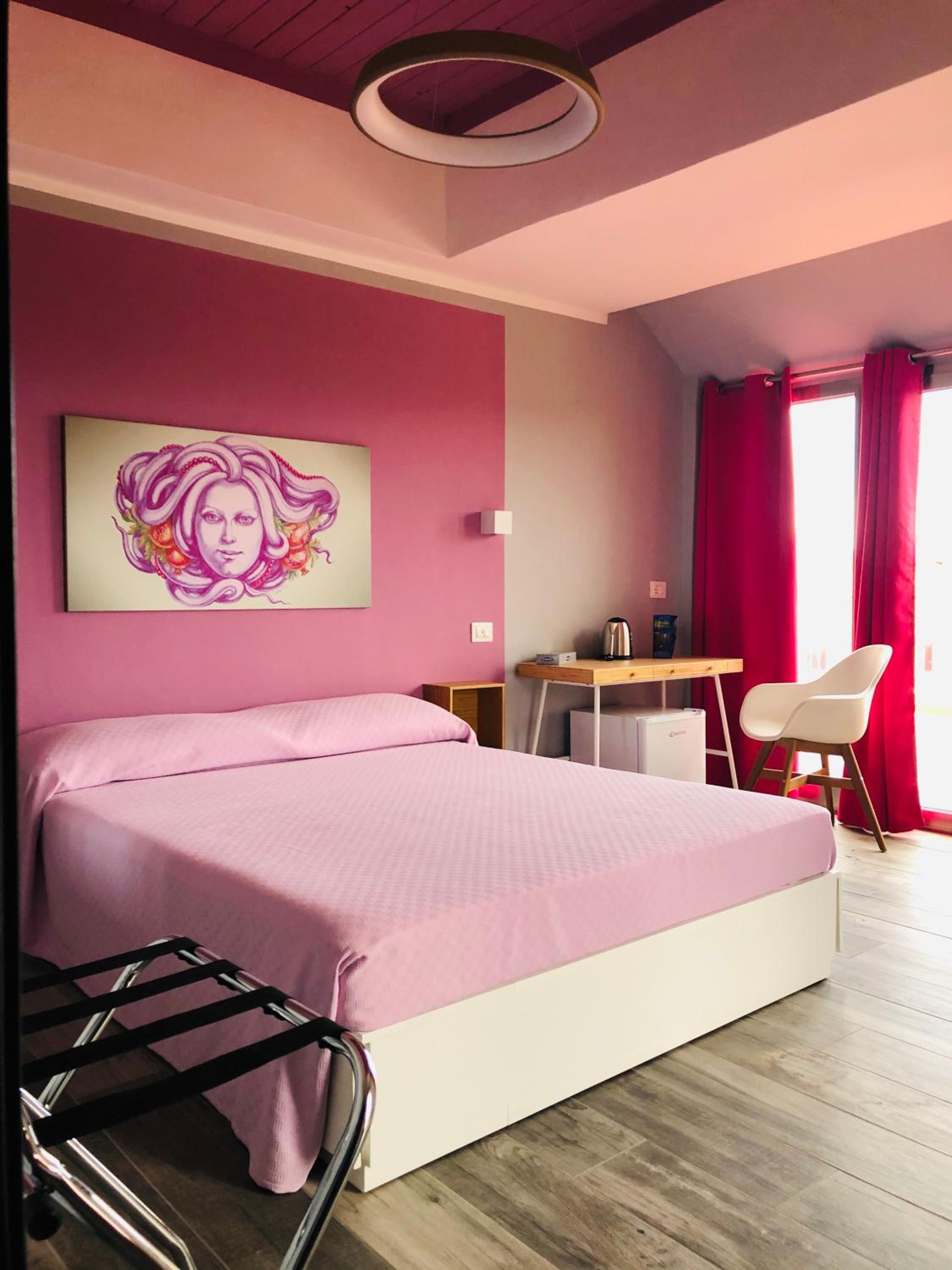 Quadruple Room with Private Bathroom