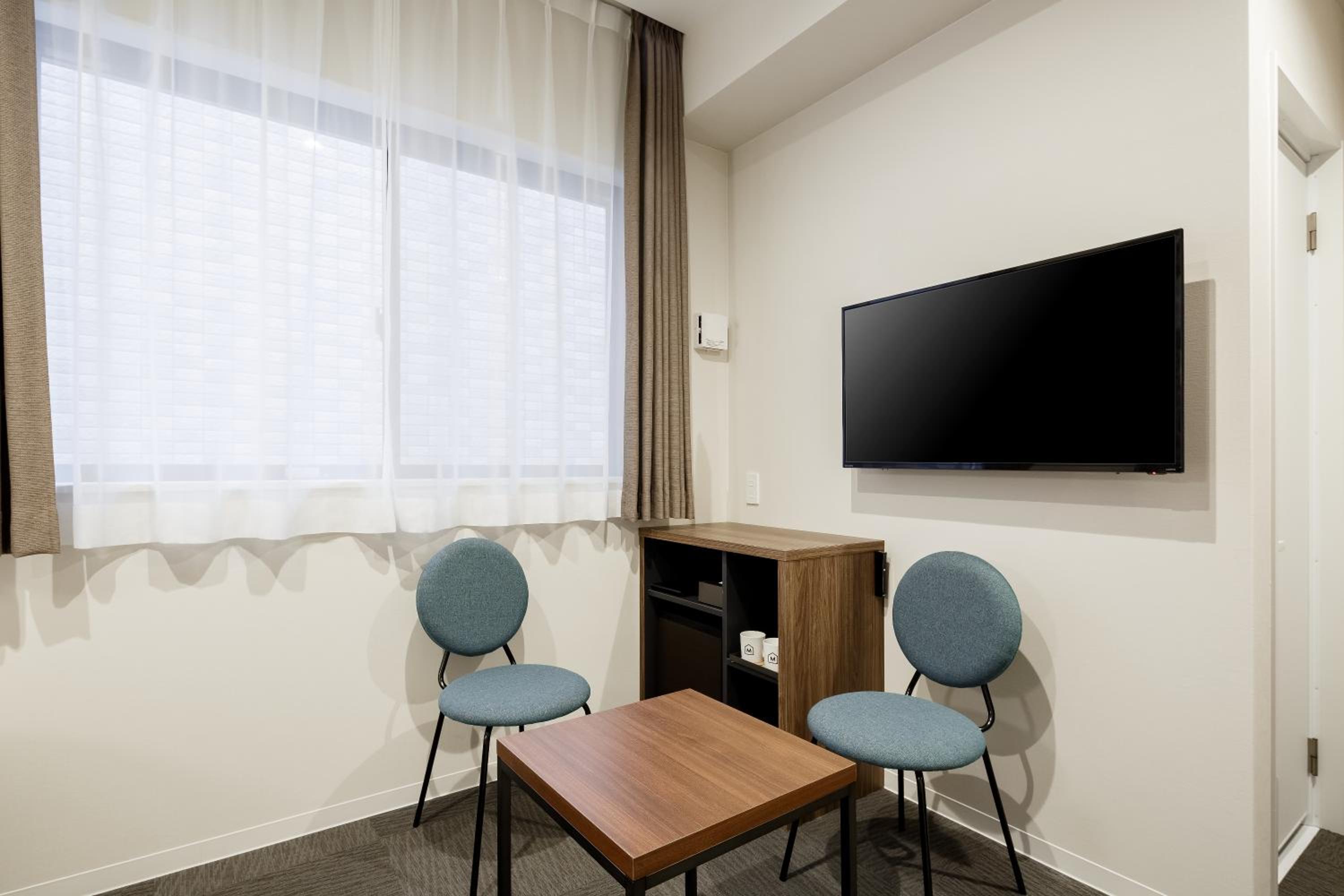 Twin Room - Photo 8