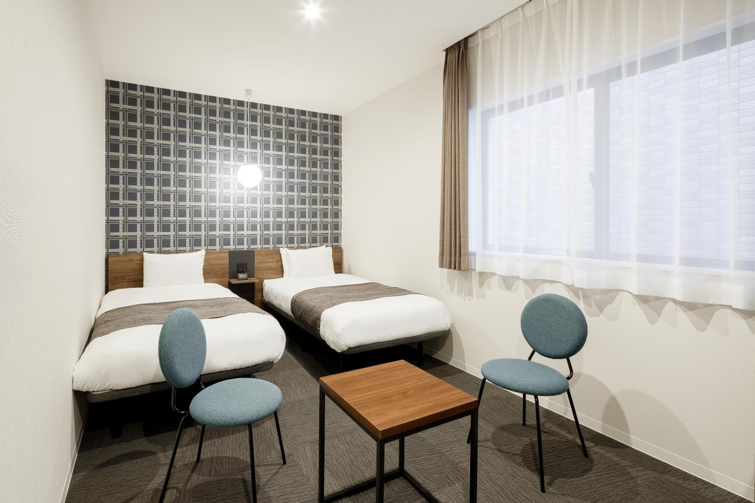 Twin Room - Photo 9