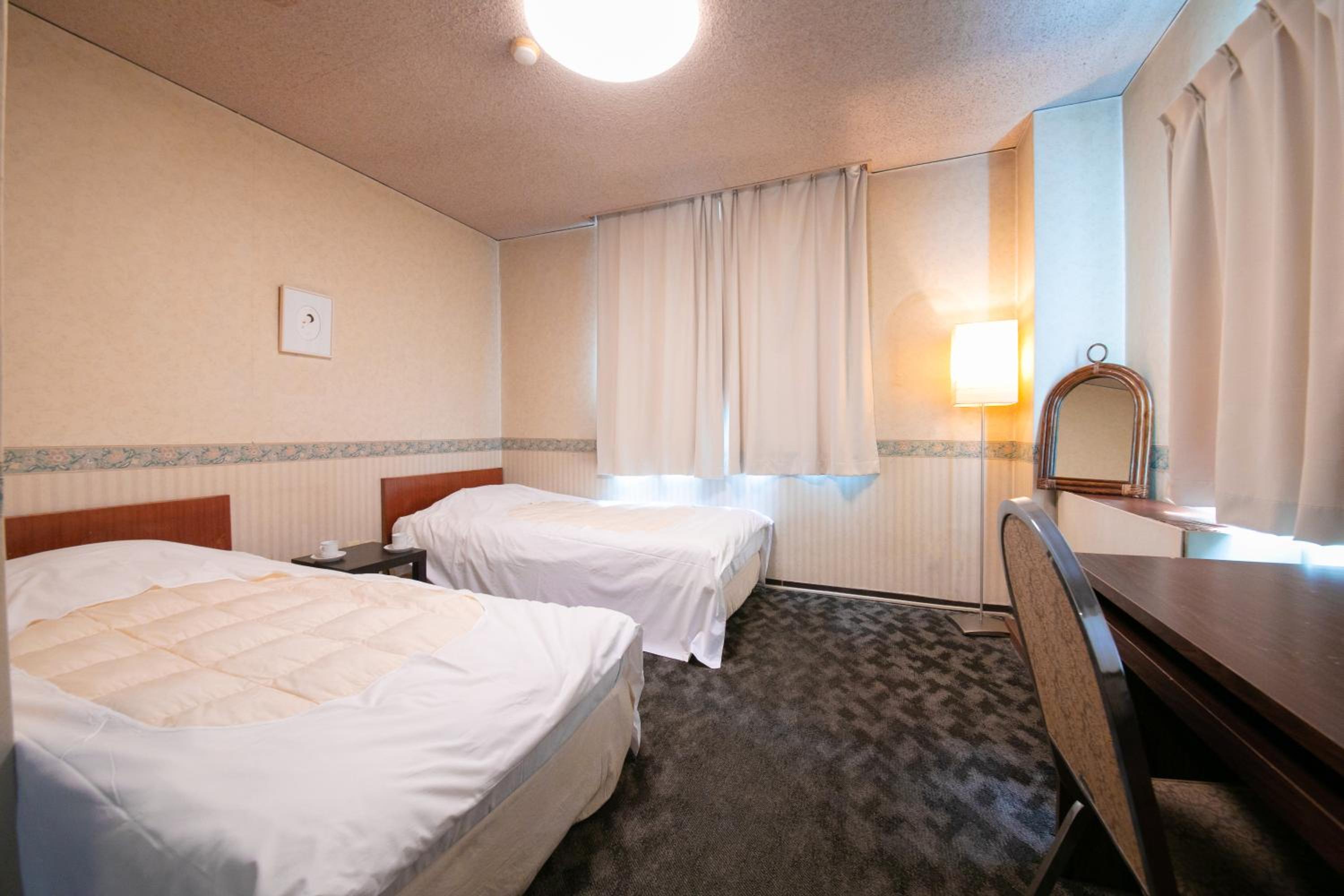 Economy Twin Room - Photo 1