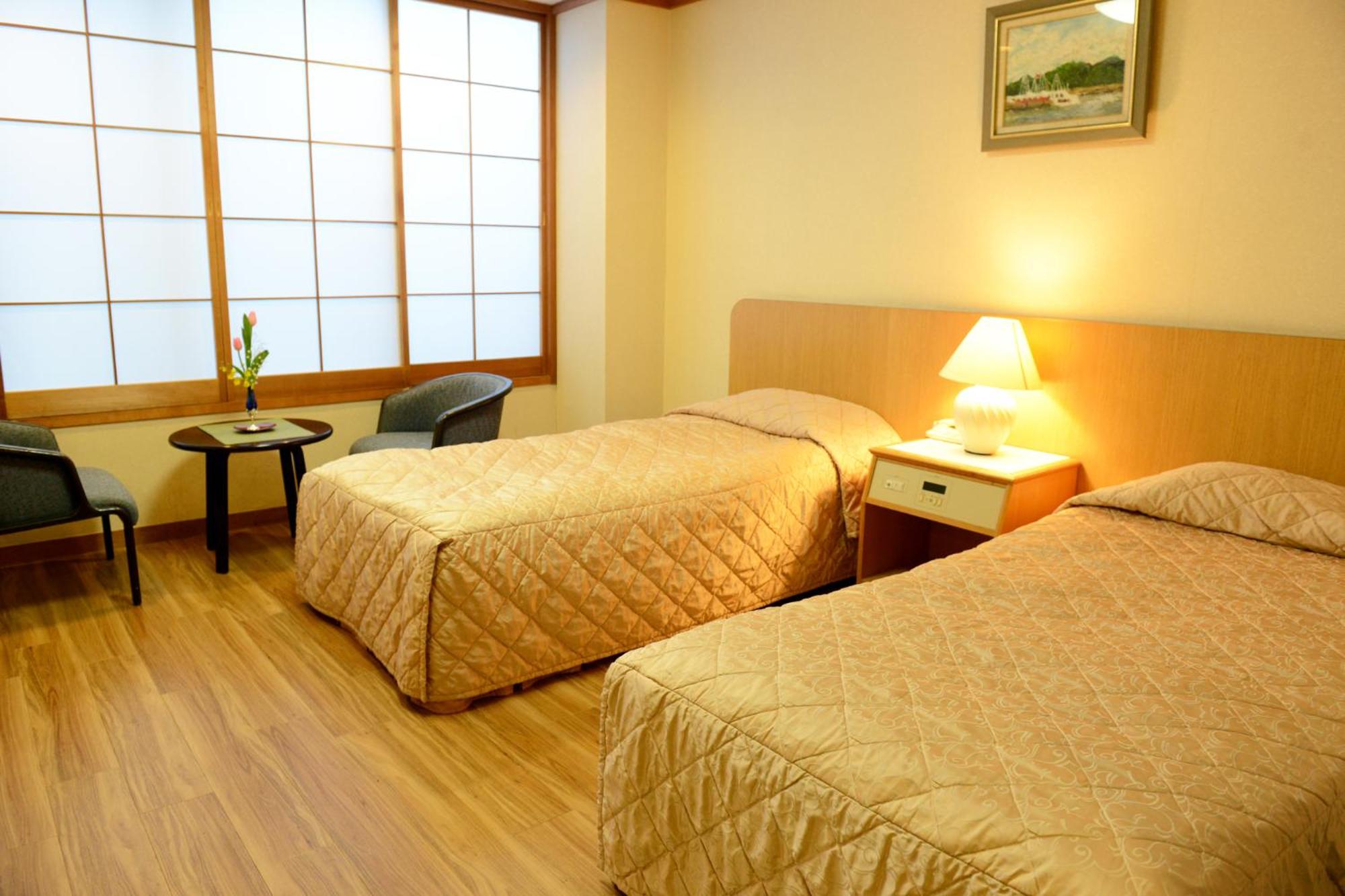 Standard Twin Room - Photo 1
