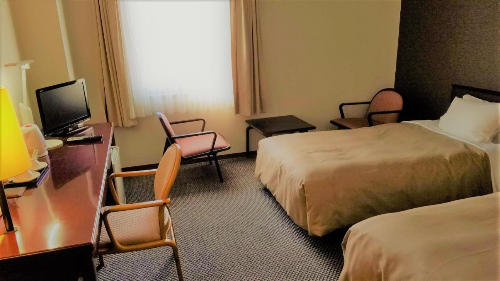 Economy Twin Room - Non-Smoking photo 1