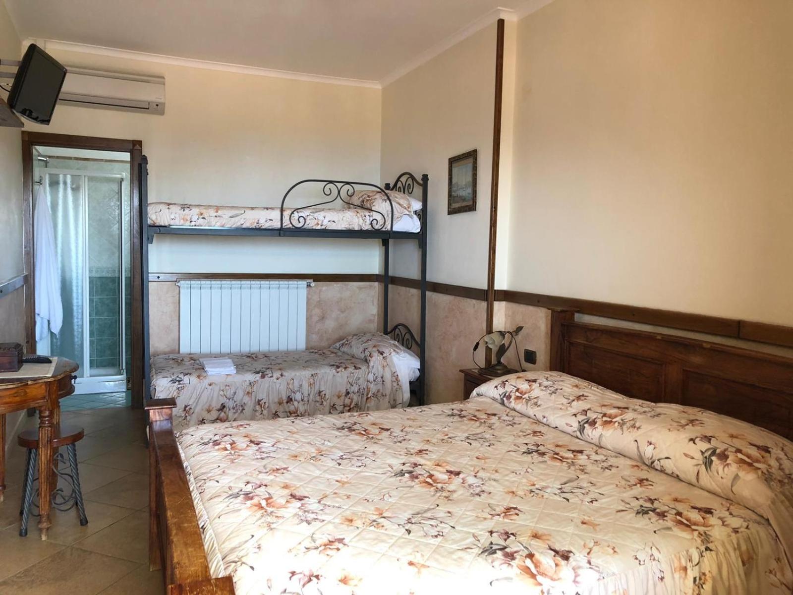 Quadruple Room with Balcony