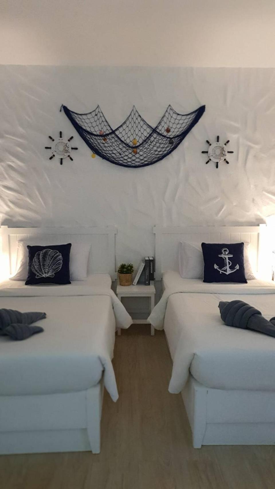Standard Twin Room - Photo 10