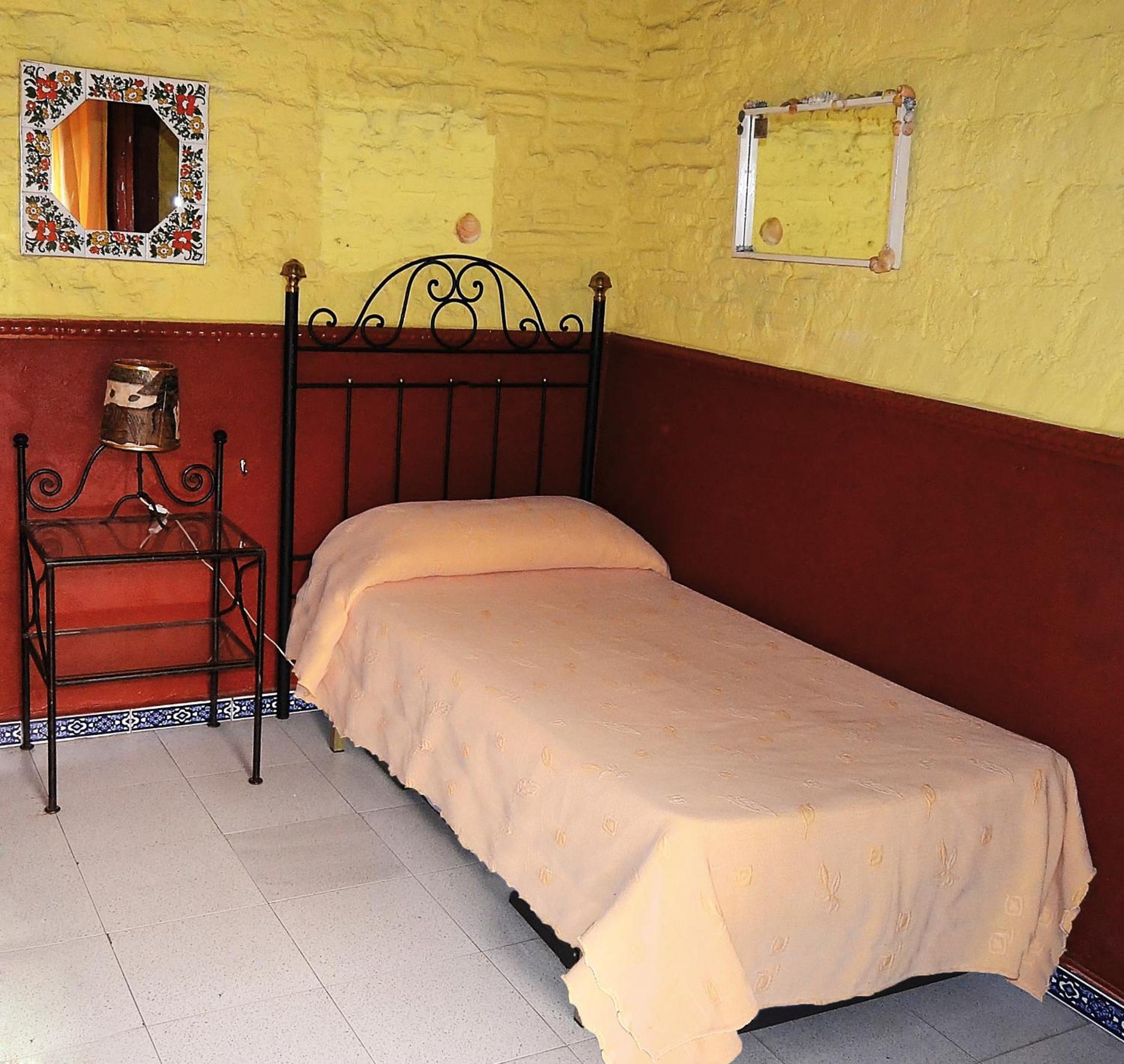 Habitación individual con baño compartido
