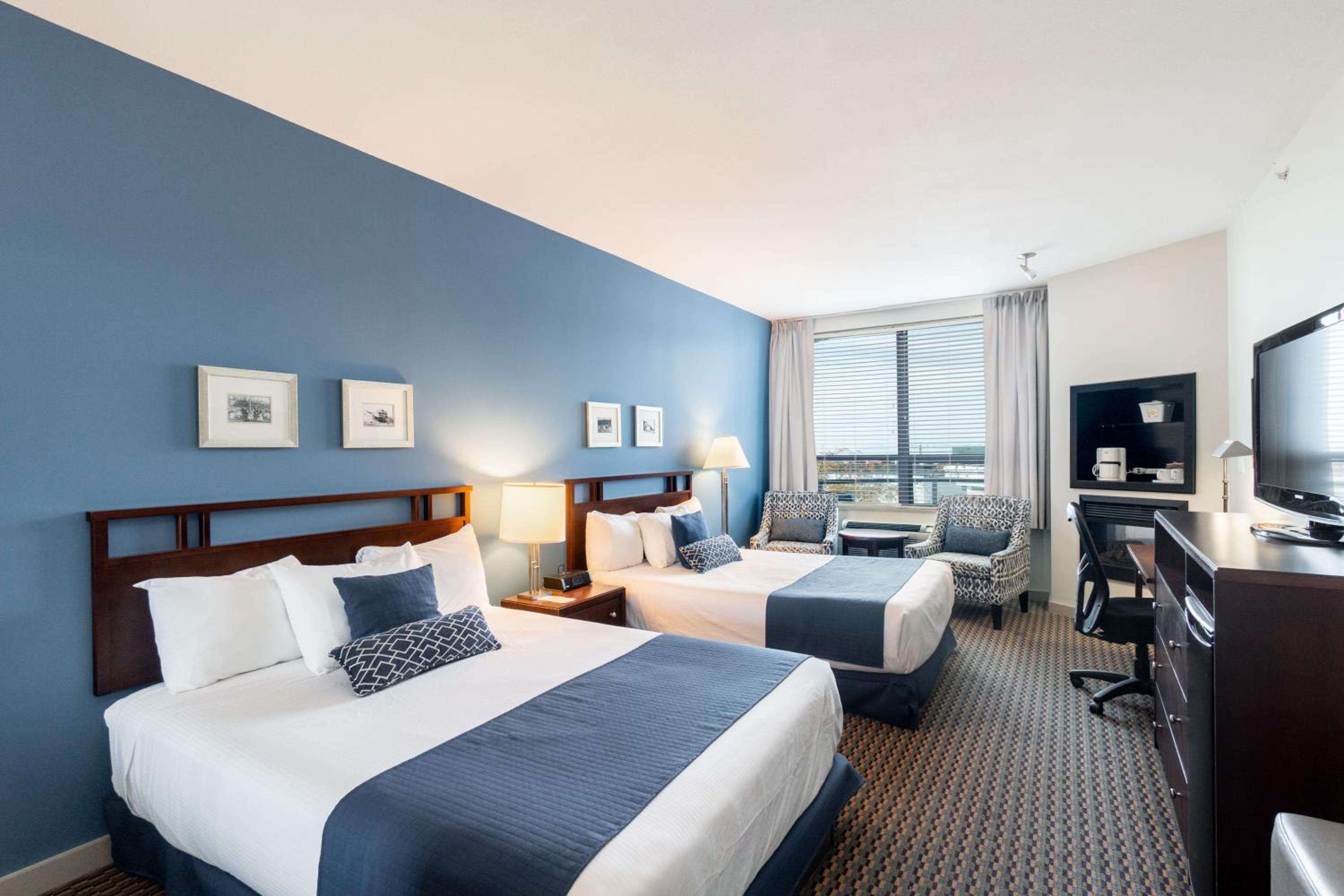 Queen Room with Two Queen Beds - Photo 1