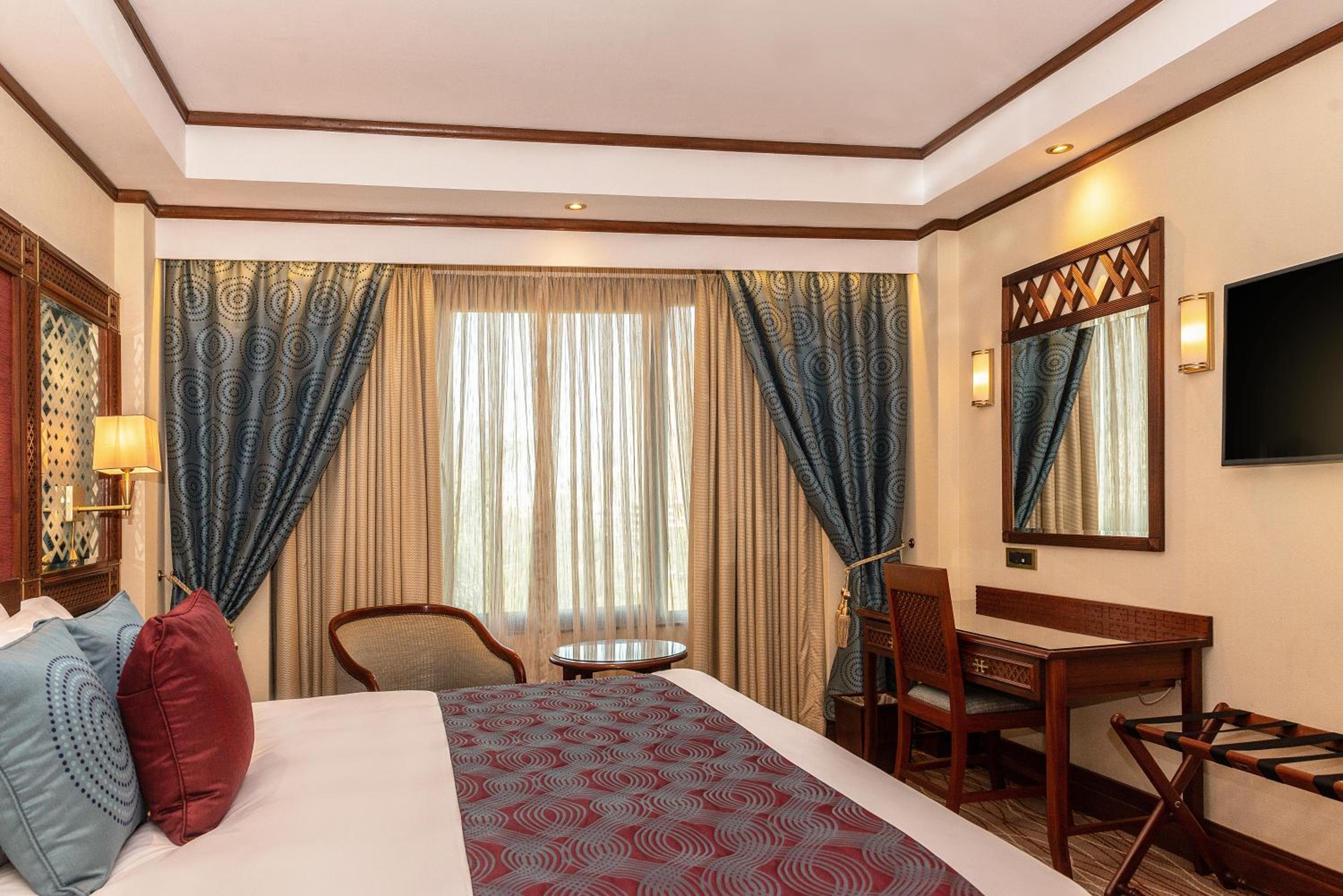 Deluxe Room - Photo 1