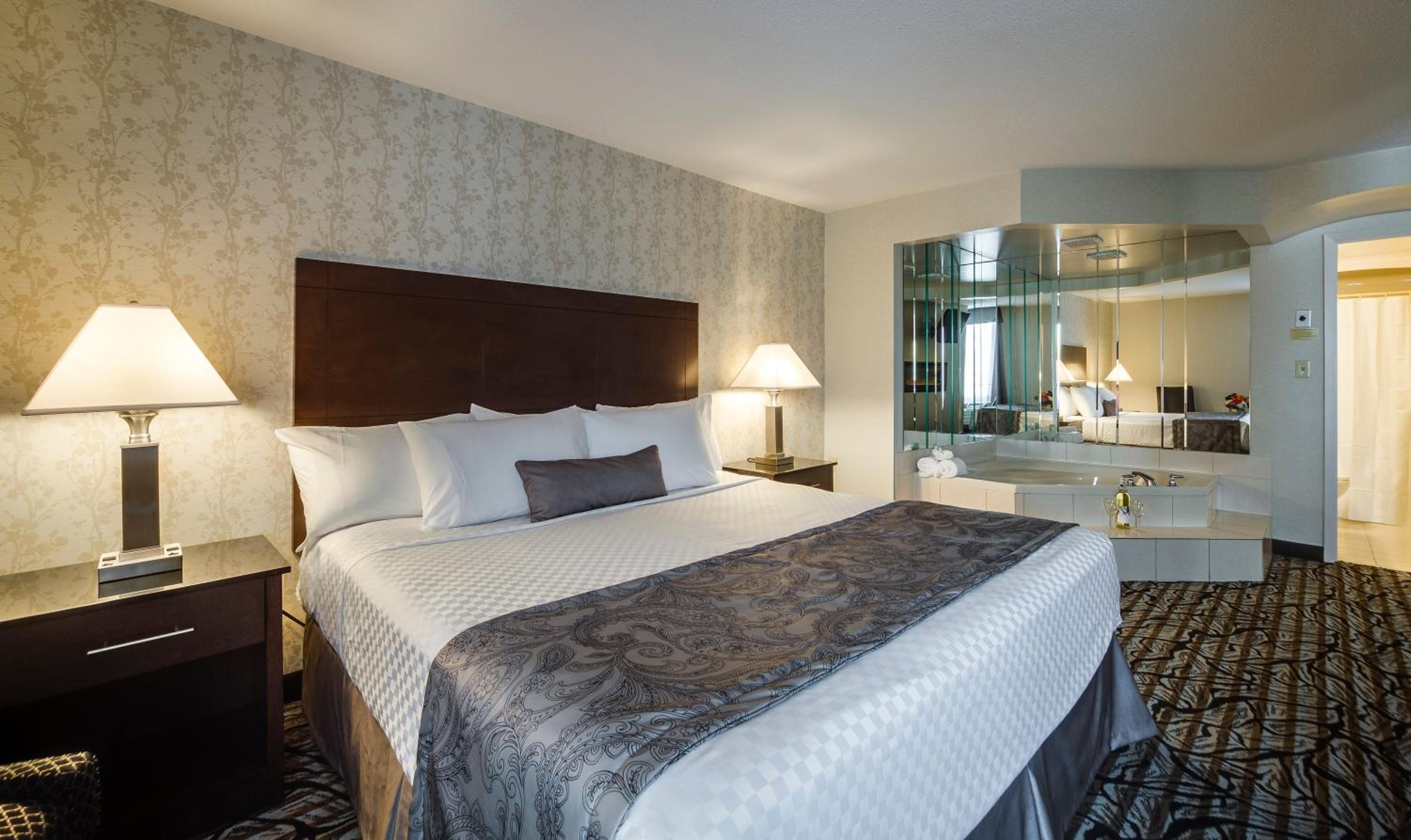 Deluxe King Suite with Jetted Tub and Living Room - Photo 1