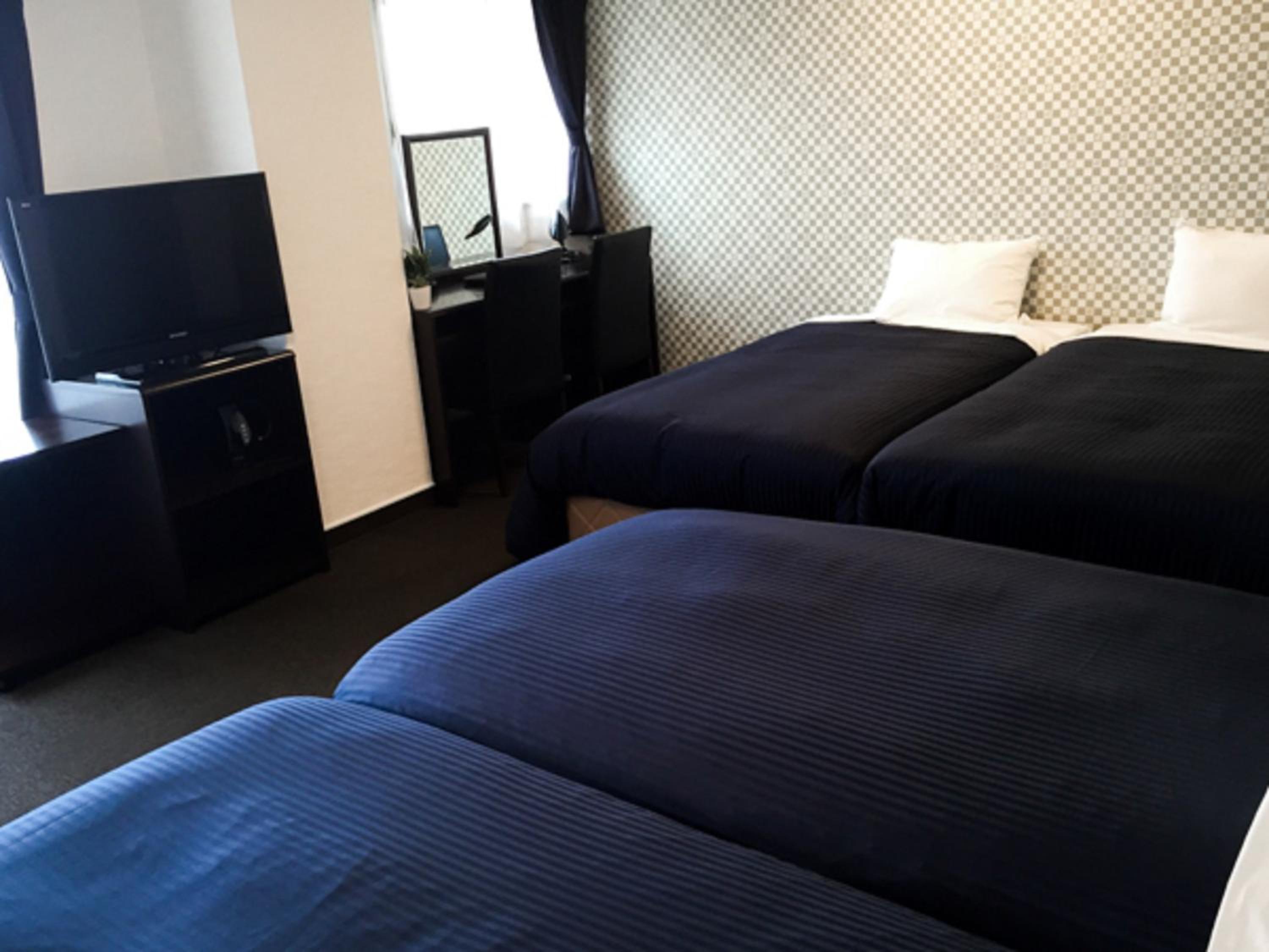 Quadruple Room - Smoking photo 1