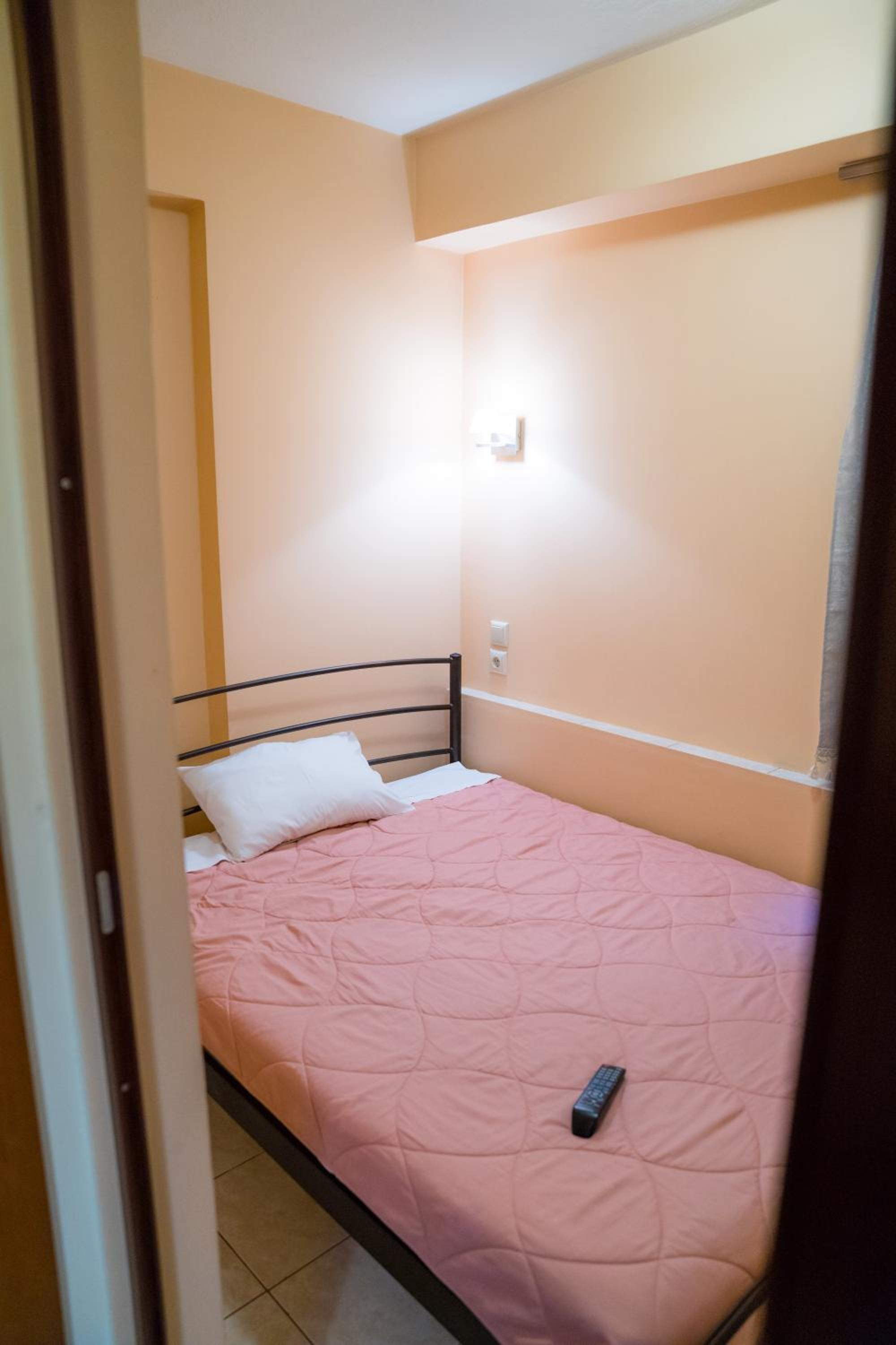 Quadruple Room with Balcony - Photo 13