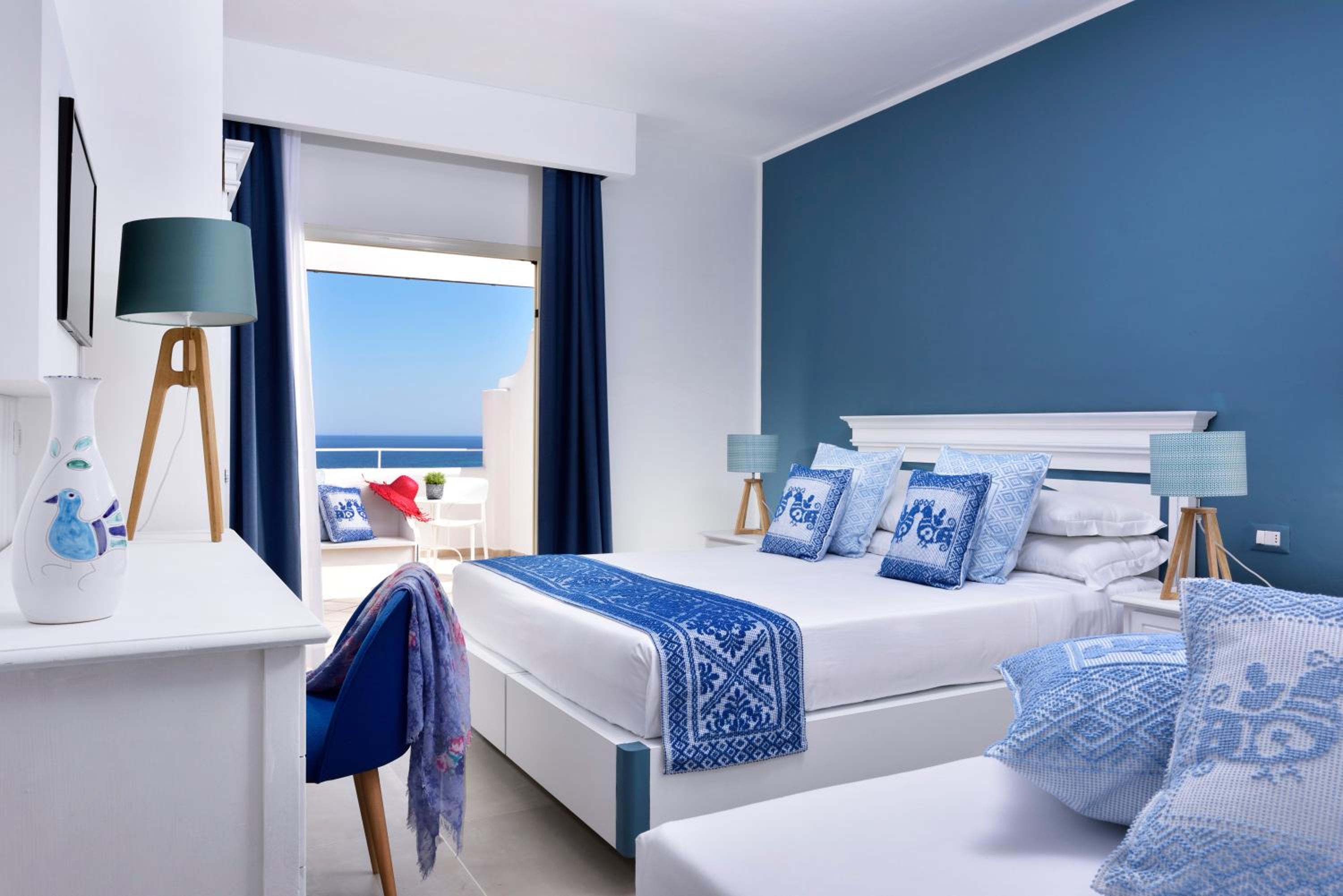 Deluxe Triple Room with Sea View ( 2 adults + 1 child)