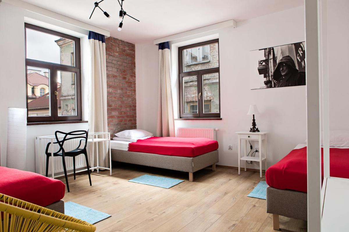 Quadruple Room with Private Bathroom - Photo 1