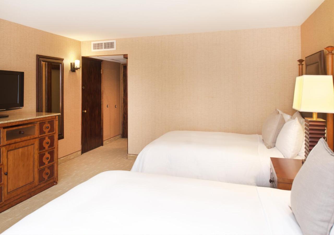 Standard Queen Room with Two Queen Beds - Photo 1