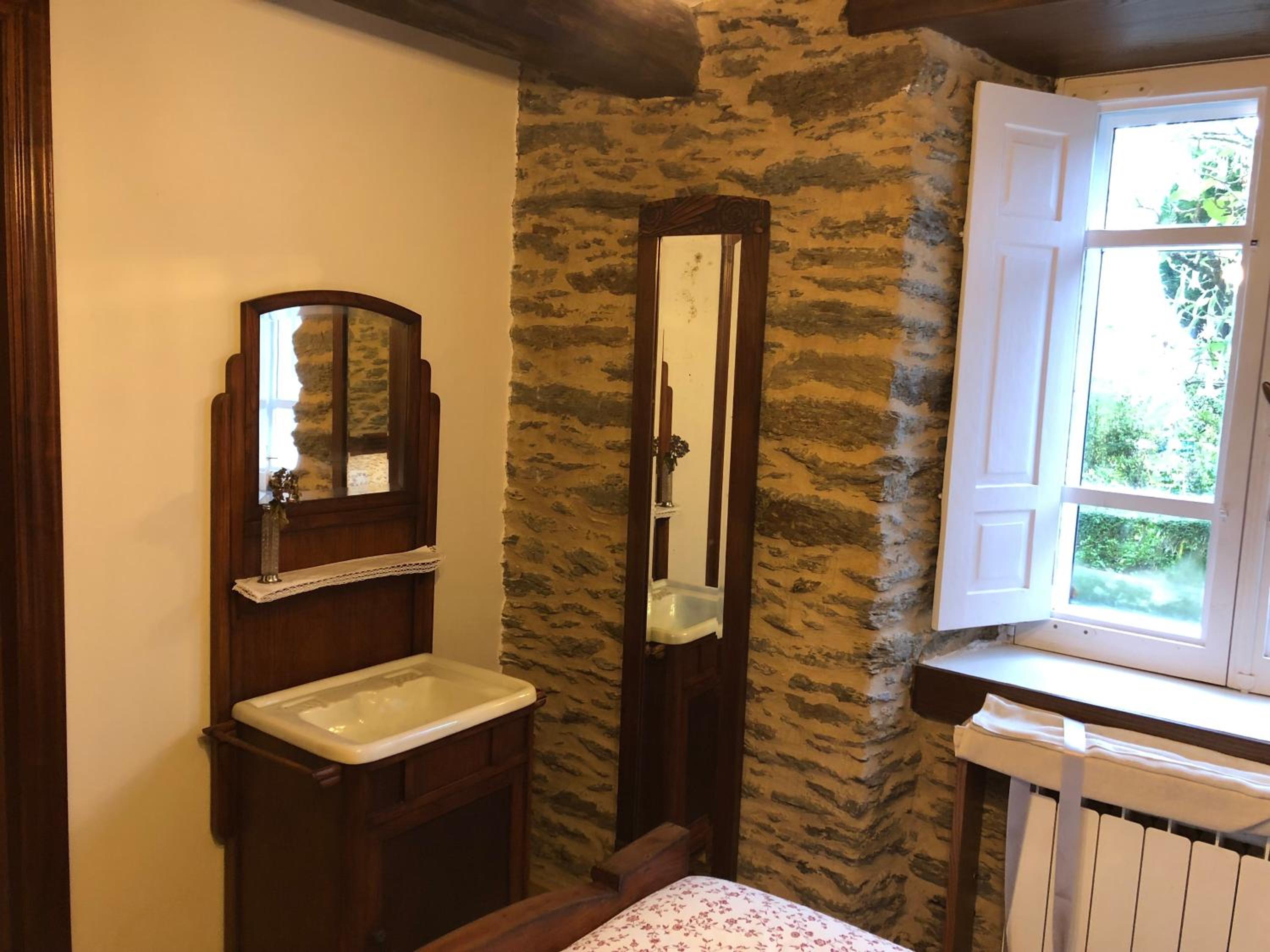 Three-Bedroom House - Photo 18