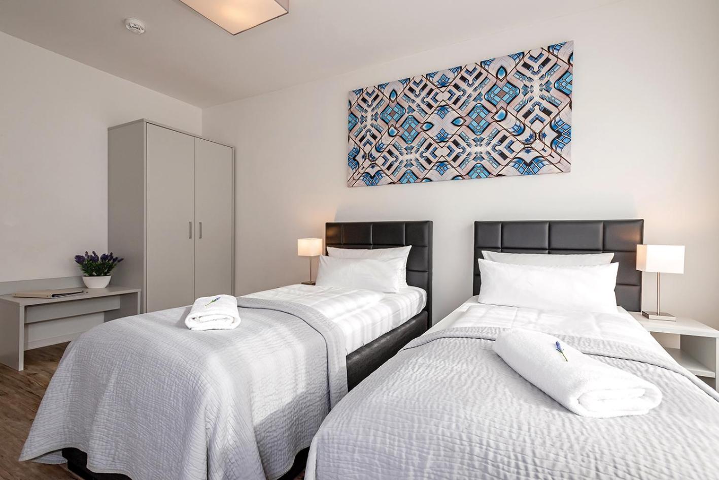 Three-Bedroom Apartment with Balcony photo 3