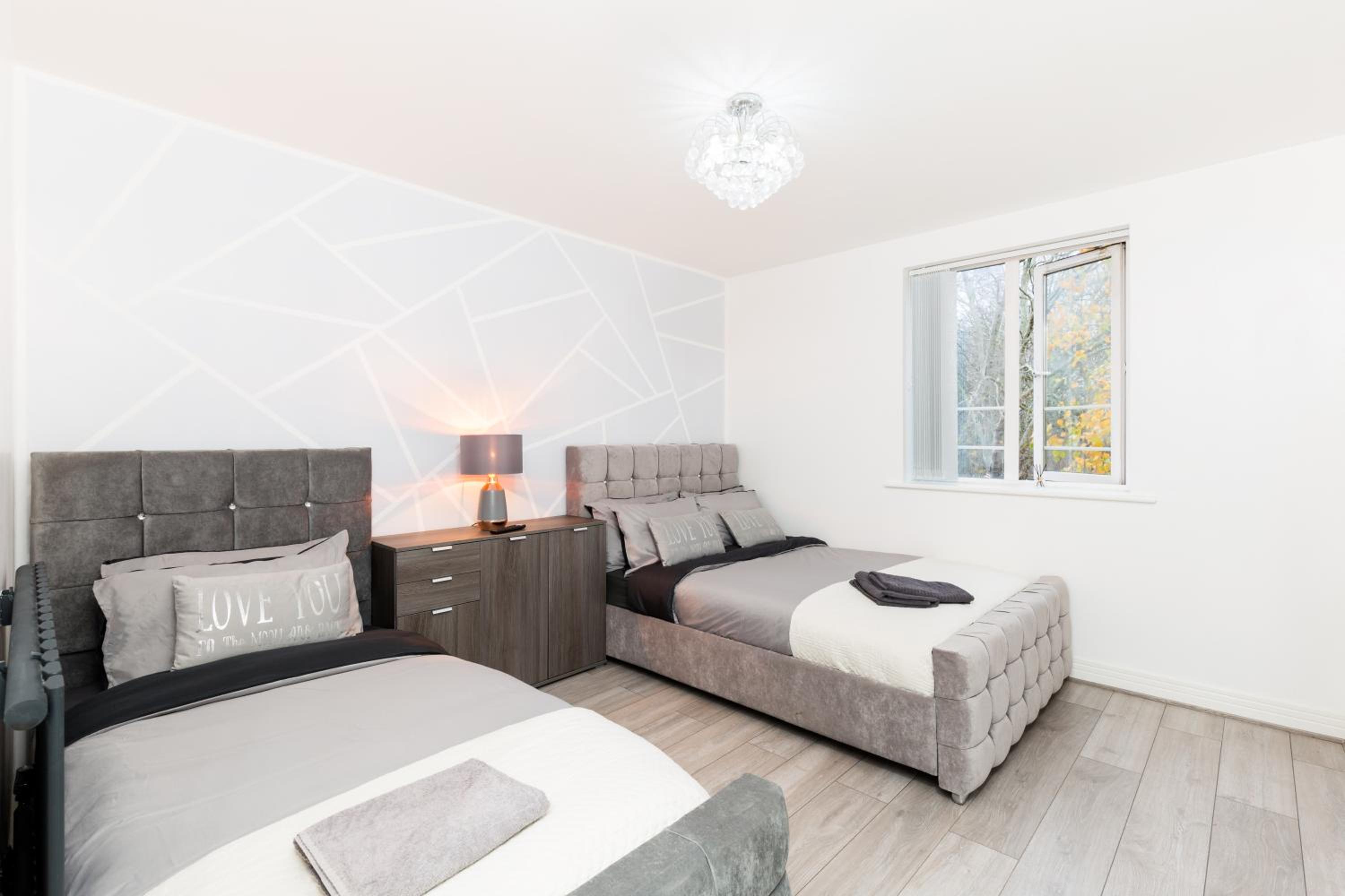 Three-Bedroom Apartment - Photo 10