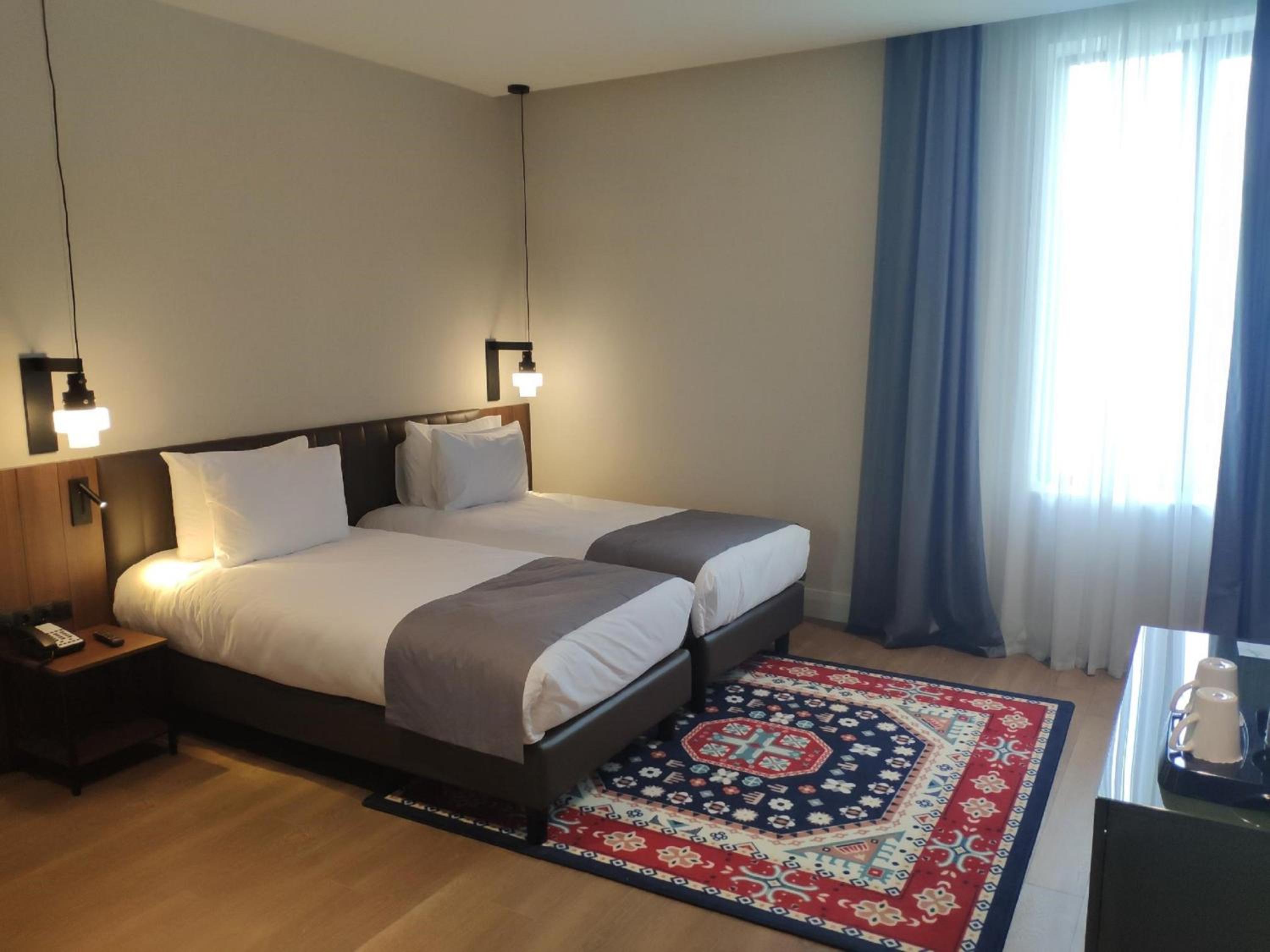 Standard Twin Room - Photo 12