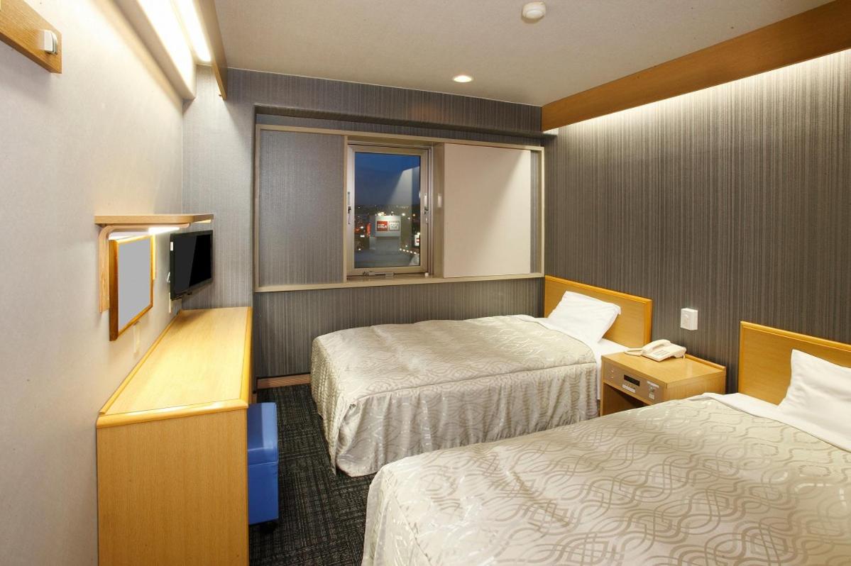Twin Room - Non-Smoking - Photo 1