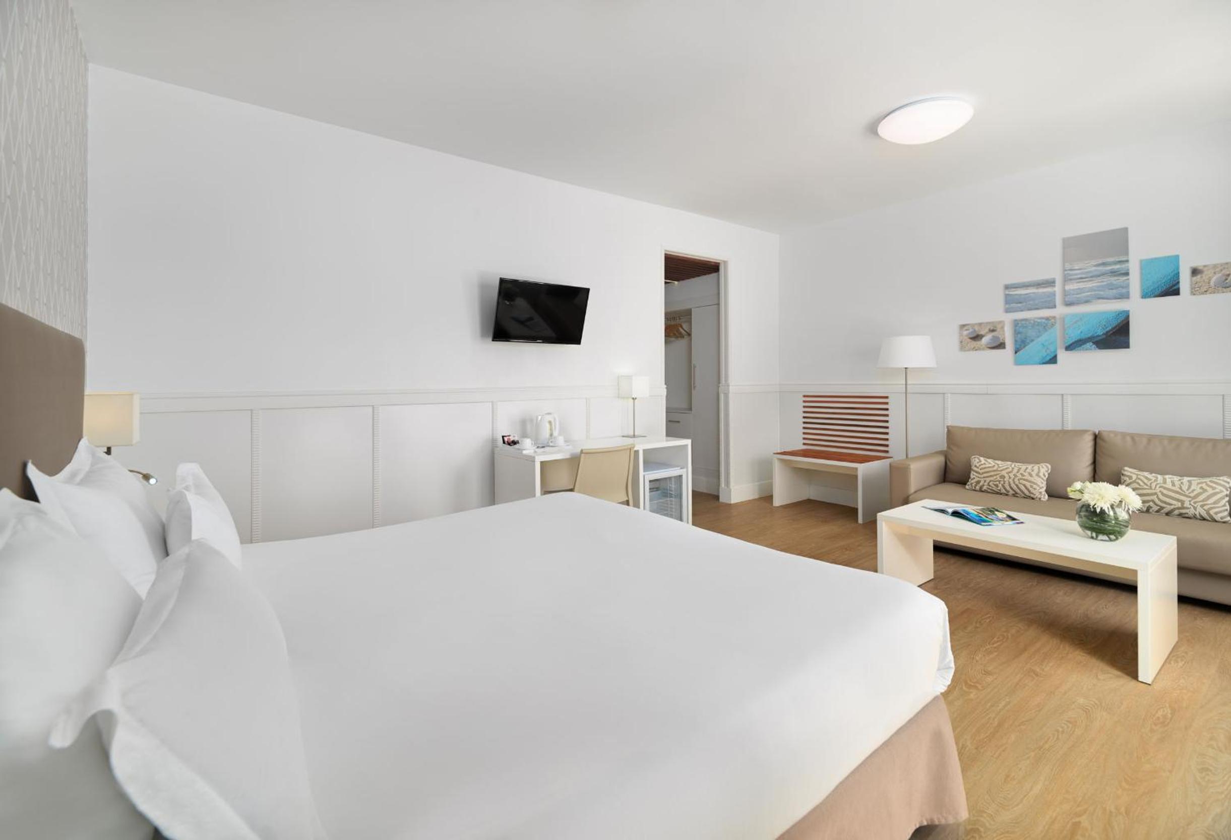 Habitación Doble (2 adultos + 1 niño)