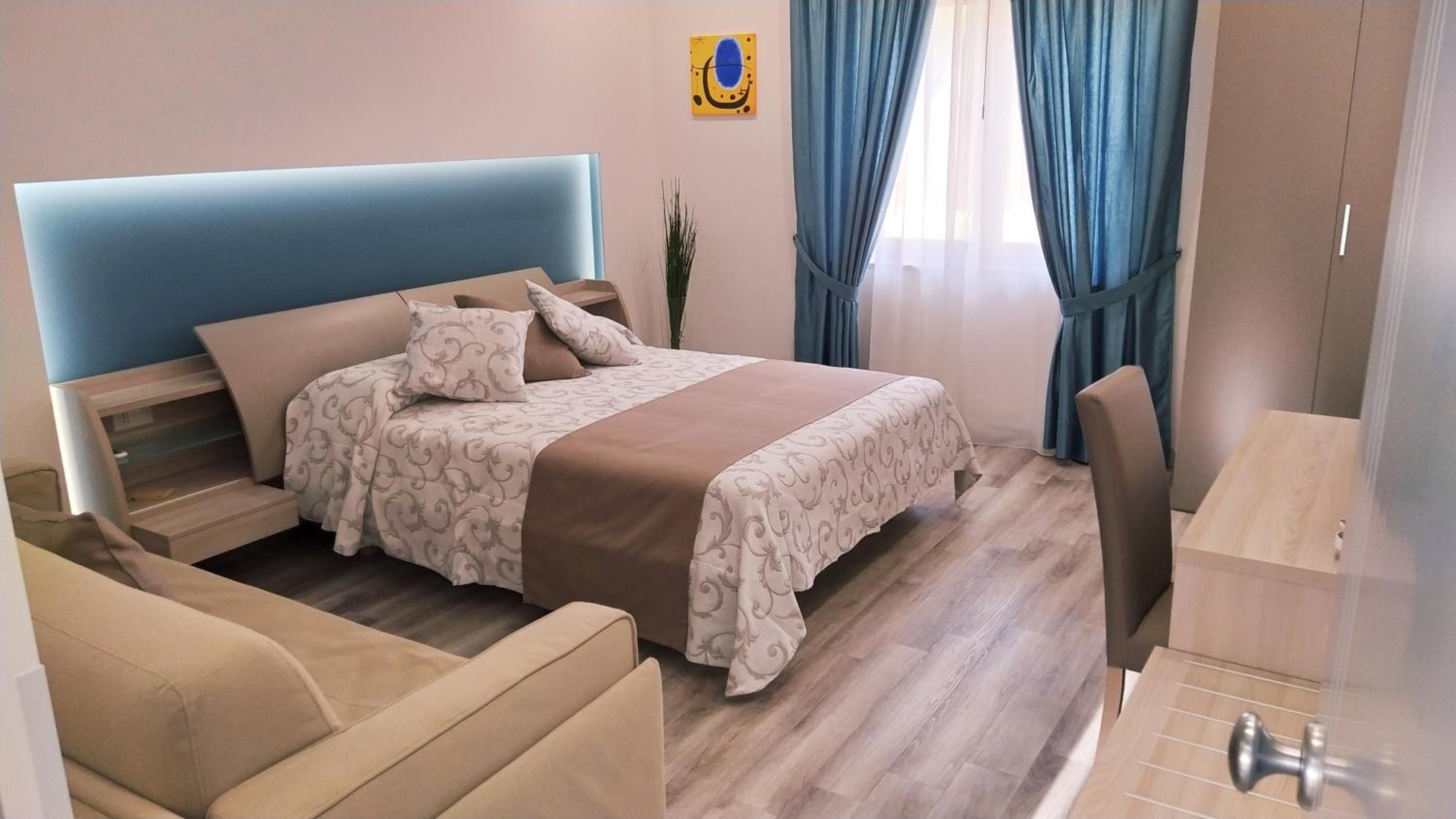 Deluxe Quadruple Room - Photo 13