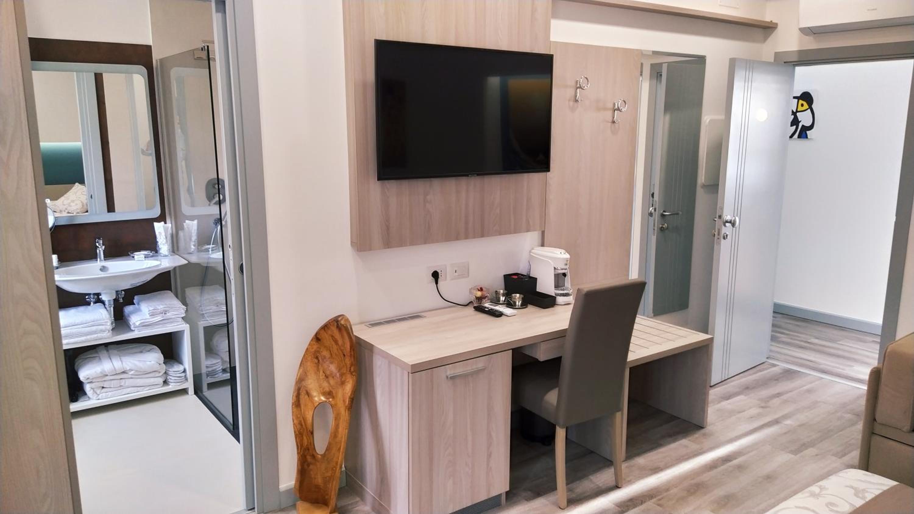 Deluxe Quadruple Room - Photo 18