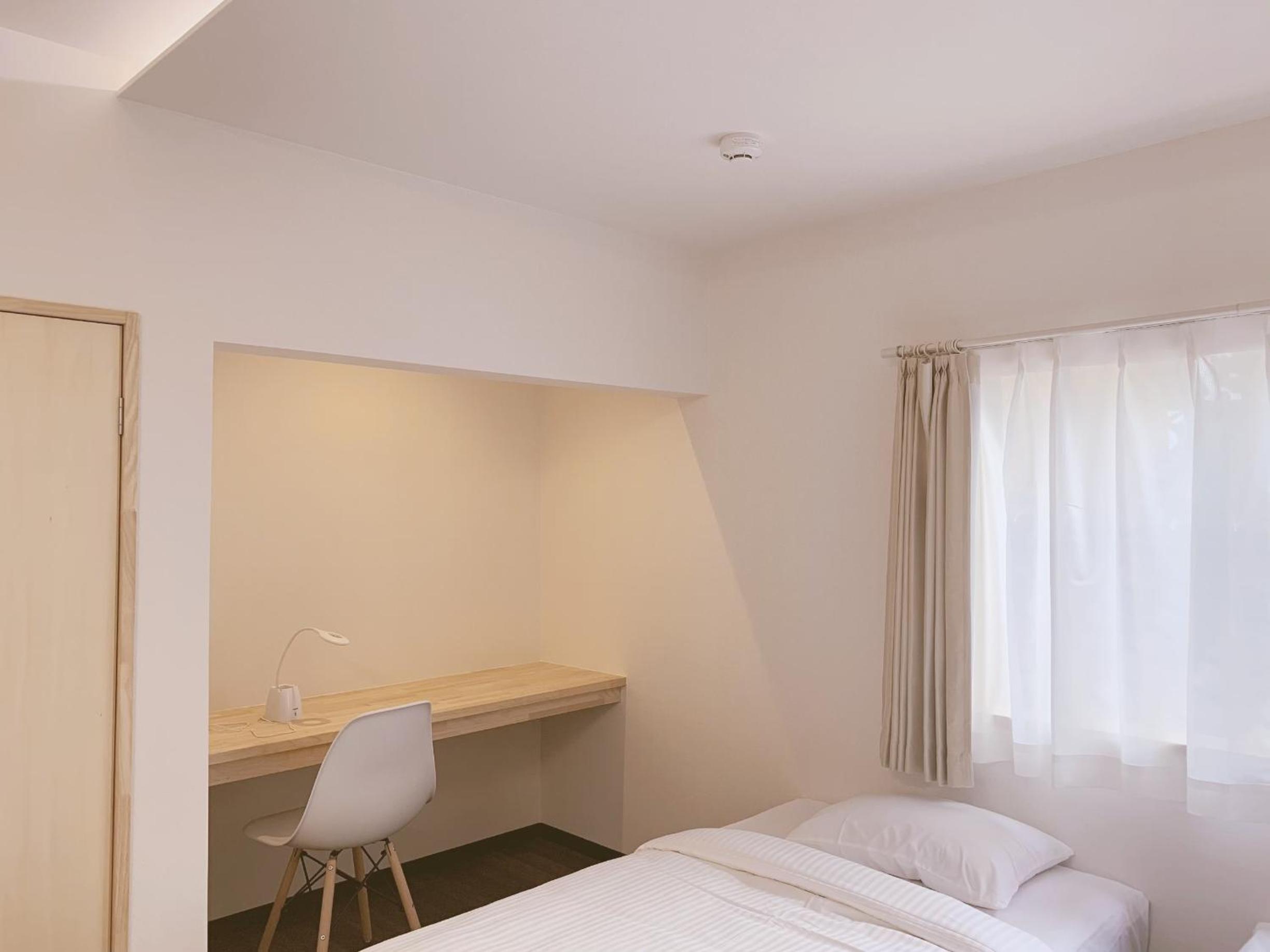 Deluxe Triple Room - Photo 21