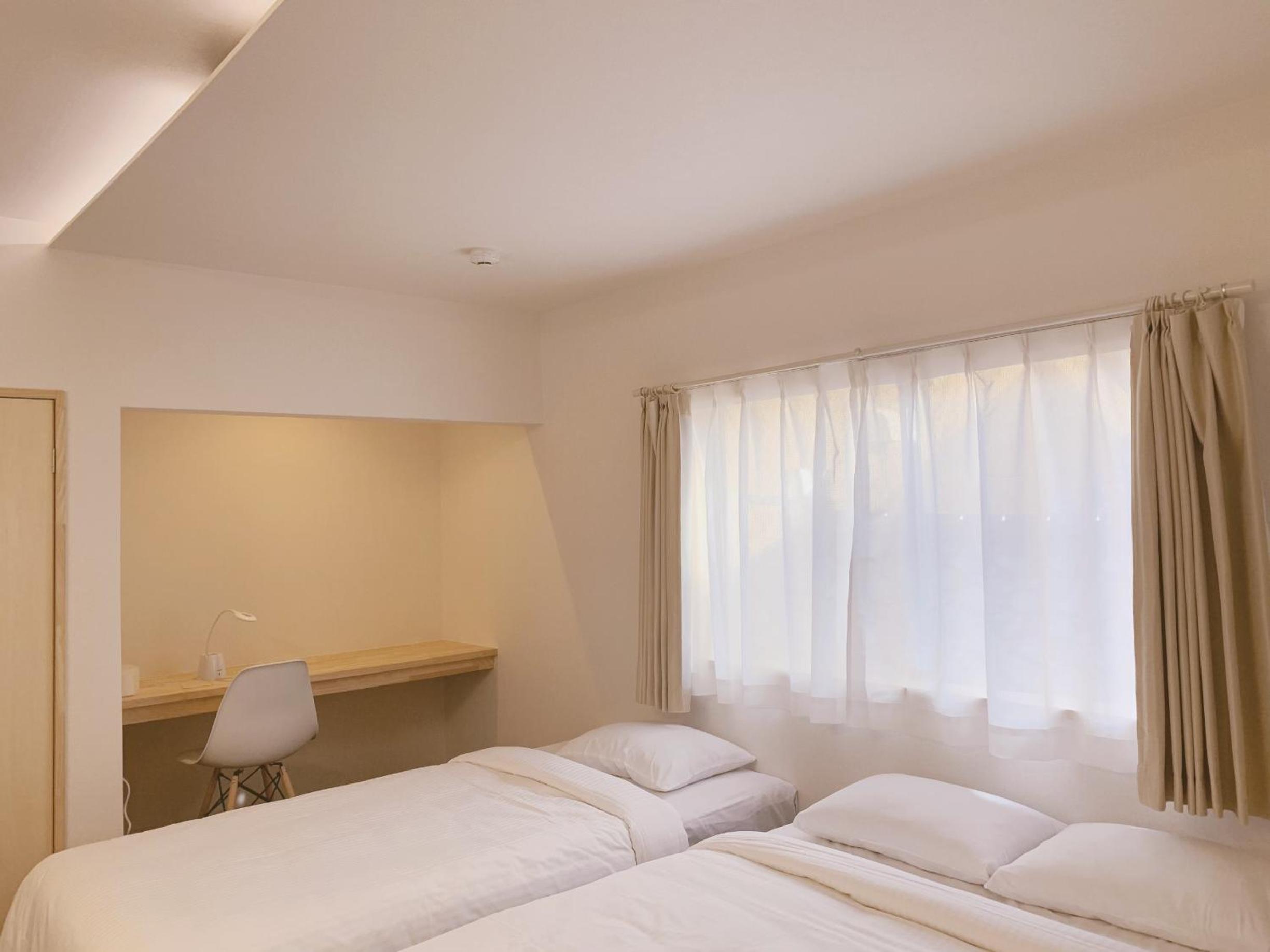 Deluxe Triple Room - Photo 2