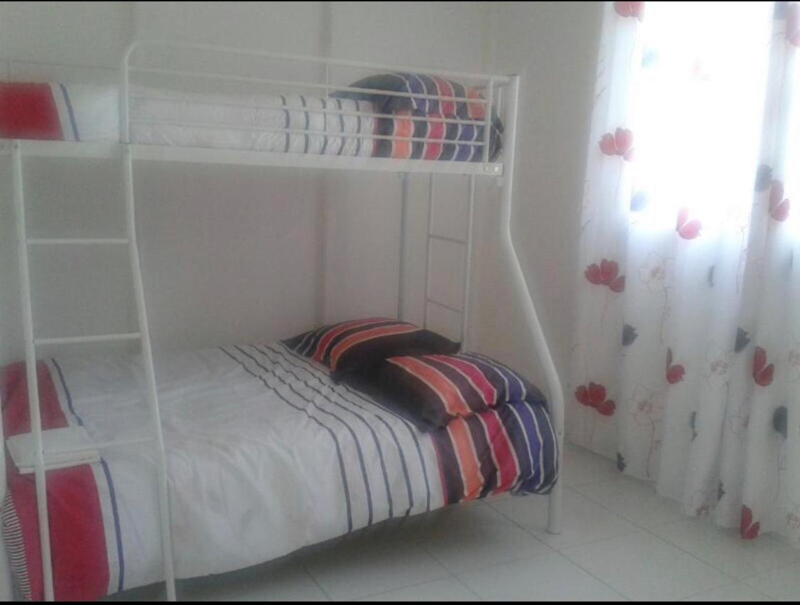 Three-Bedroom House - Photo 13